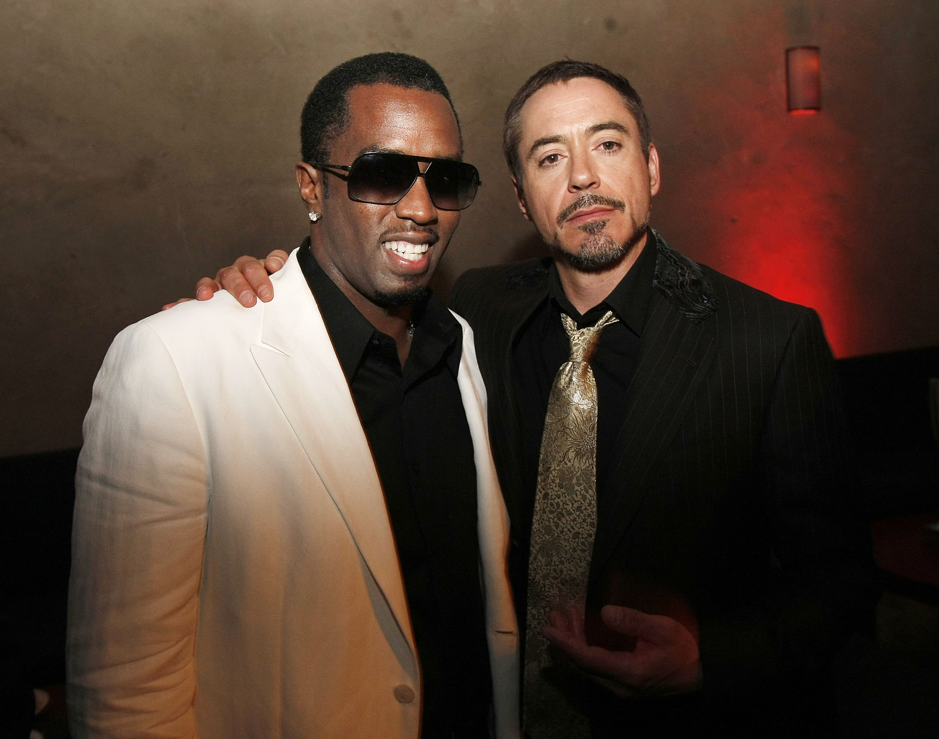Hip Hop artist Sean Combs (L) and actor Robert Downey Jr. pose at the afterparty for the premiere of Paramount's "Iron Man" at the Roosevelt Hotel on April 30, 2008 in Los Angeles, California. (Photo by Kevin Winter/Getty Images)
