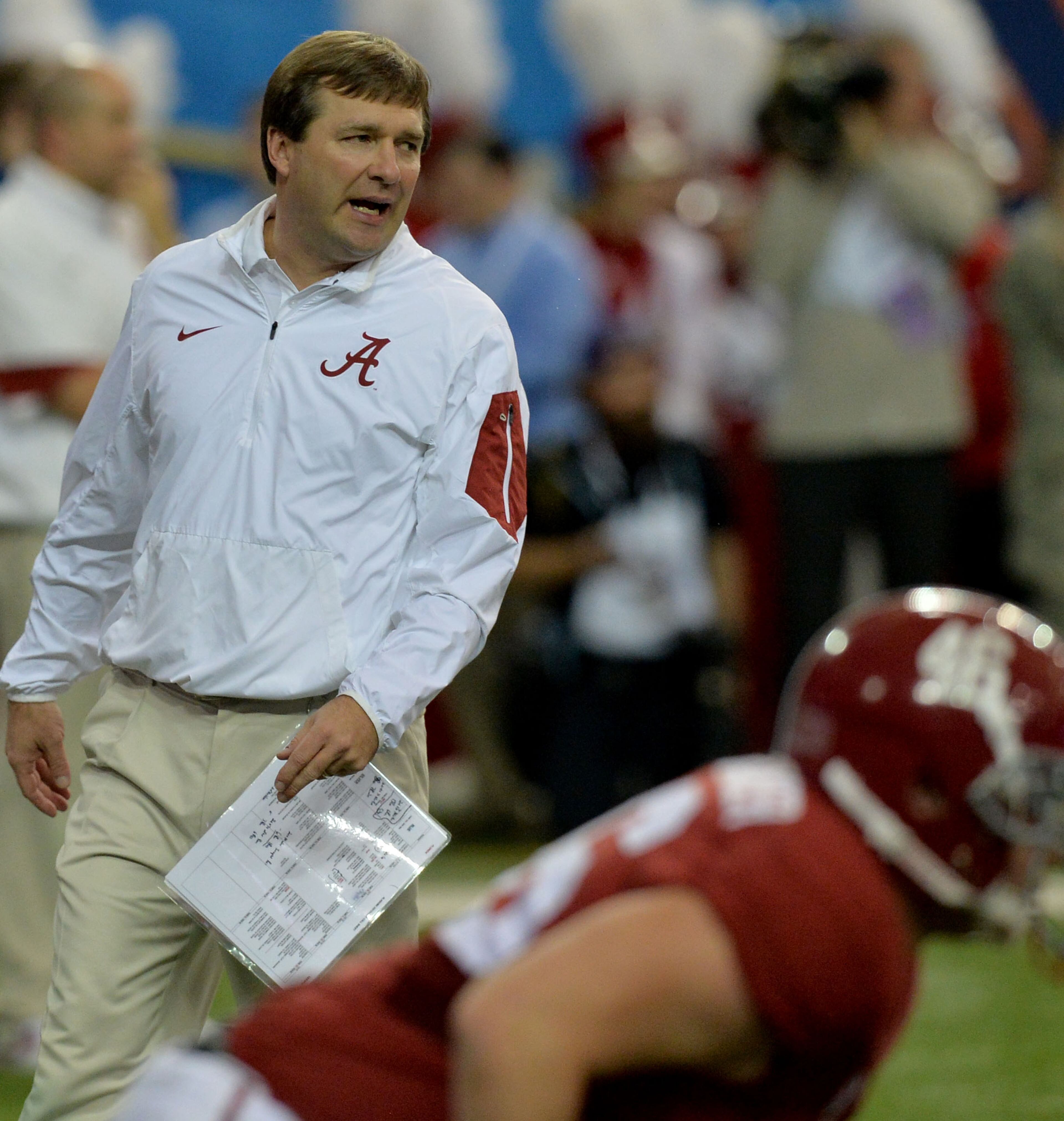 December 5, 2015 Atlanta: Alabama Crimson Tide defensive coordinator and soon to be Georgia head coach, Kirby Smart , watches warm-ups before taking on Florida in the SEC Championship at the Georgia Dome Saturday December 5, 2015. BRANT SANDERLIN/BSANDERLIN@AJC.COM