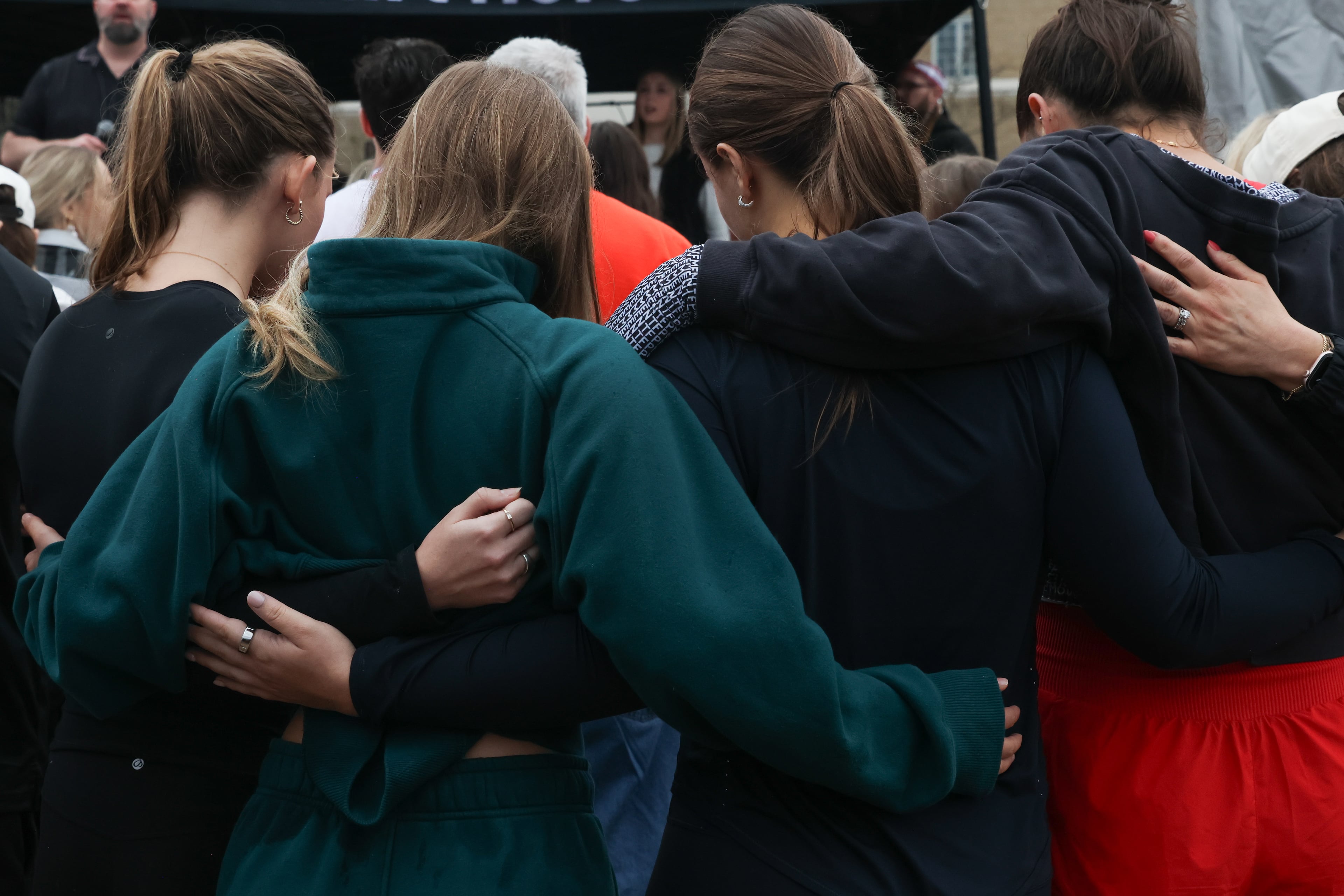 People gather at UGA’s Tate Plaza on Saturday, Feb. 21, 2026, for a memorial service for Augusta University nursing student Laken Riley. Riley was attacked on Feb. 22, 2024 while running in Oconee Forest Park on the UGA campus and killed. Riley had previously attended UGA. (C.J. Bartunek for the AJC)