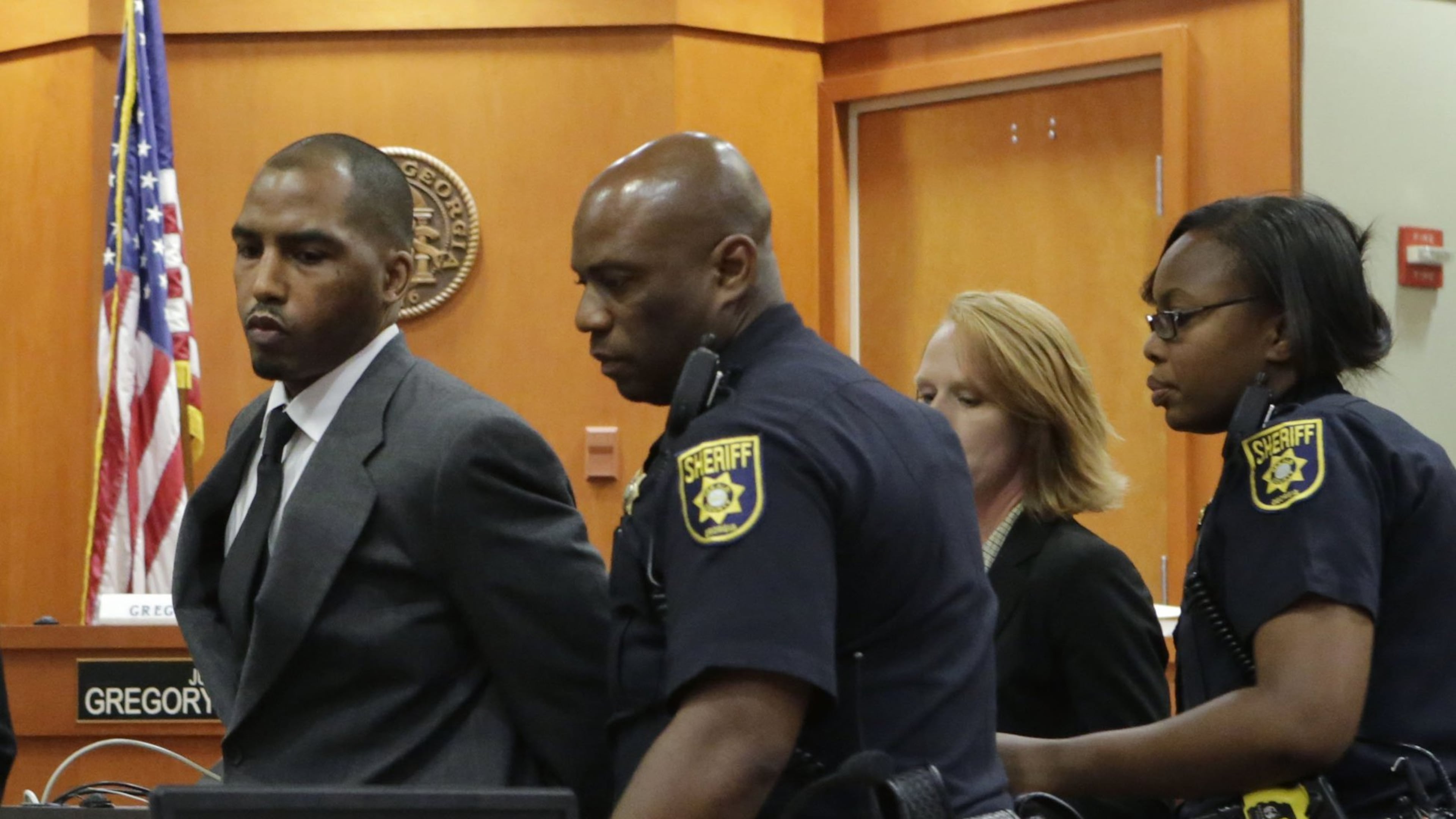 Aeman Presley is taken into custody following his plea on Monday, June 13, 2016. Presley pleaded guilty in DeKalb County Superior Court to the 2014 killing of a homeless man and the 2014 murder of a female hairstylist that he robbed. BOB ANDRES / BANDRES@AJC.COM