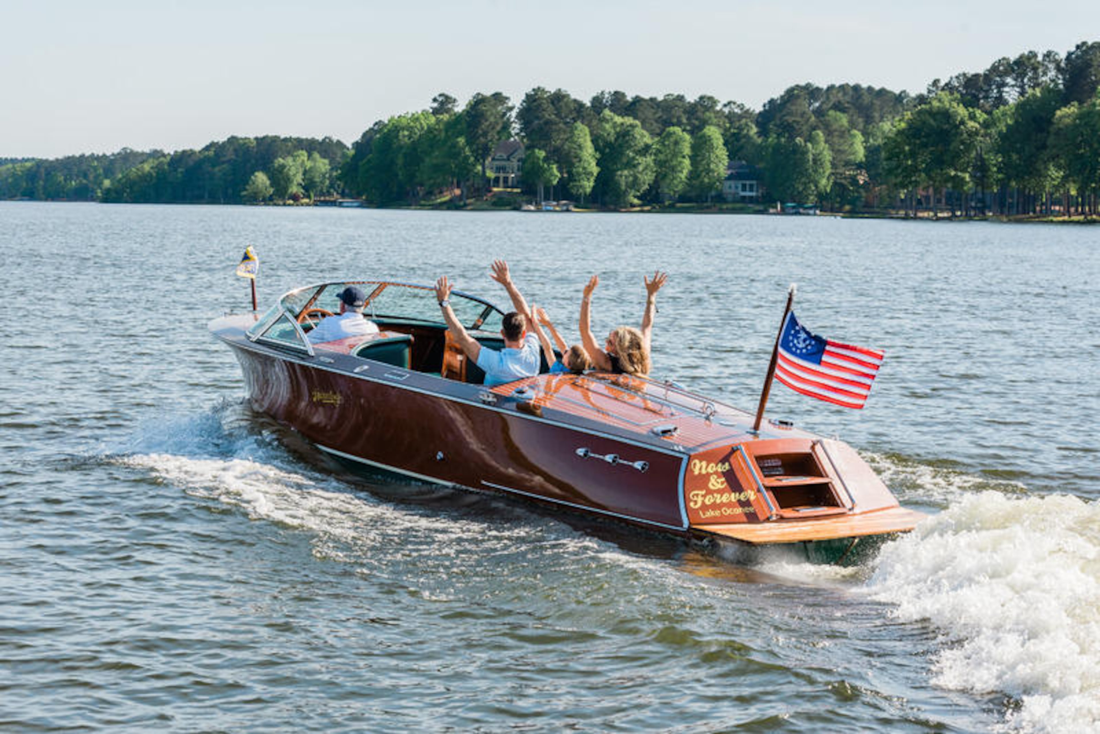 Have some lake adventures on the boat. Courtesy of Visit Lake Oconee