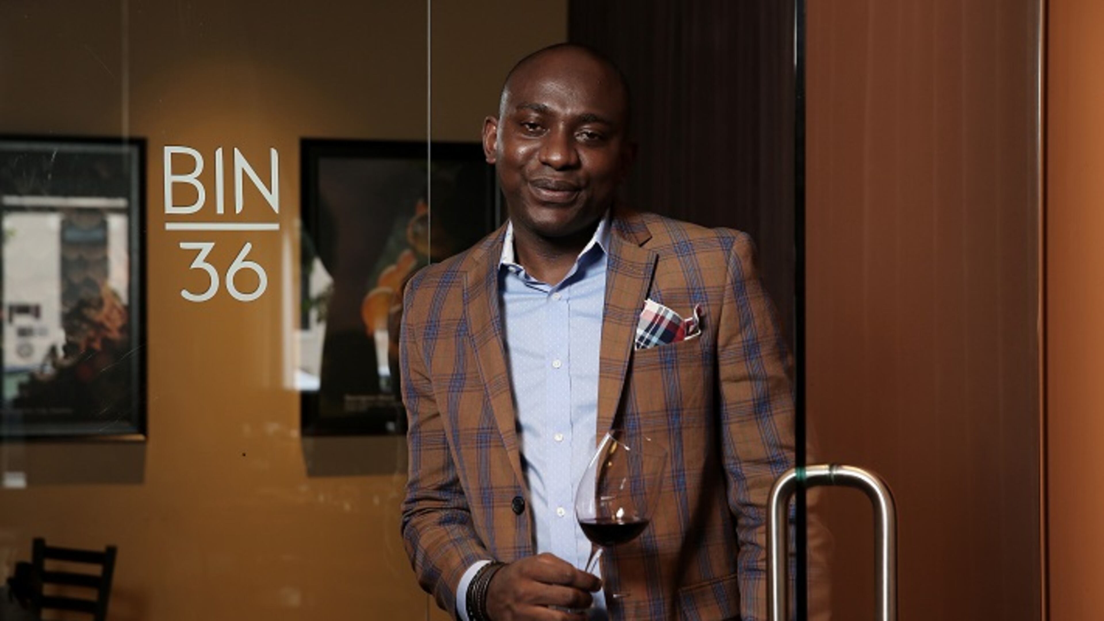 Enoch Shully, owner of Bin 36, poses for a photograph at the wine restaurant on Tuesday, Aug. 8, 2017, in Chicago, Ill. (John J. Kim/Chicago Tribune/TNS)