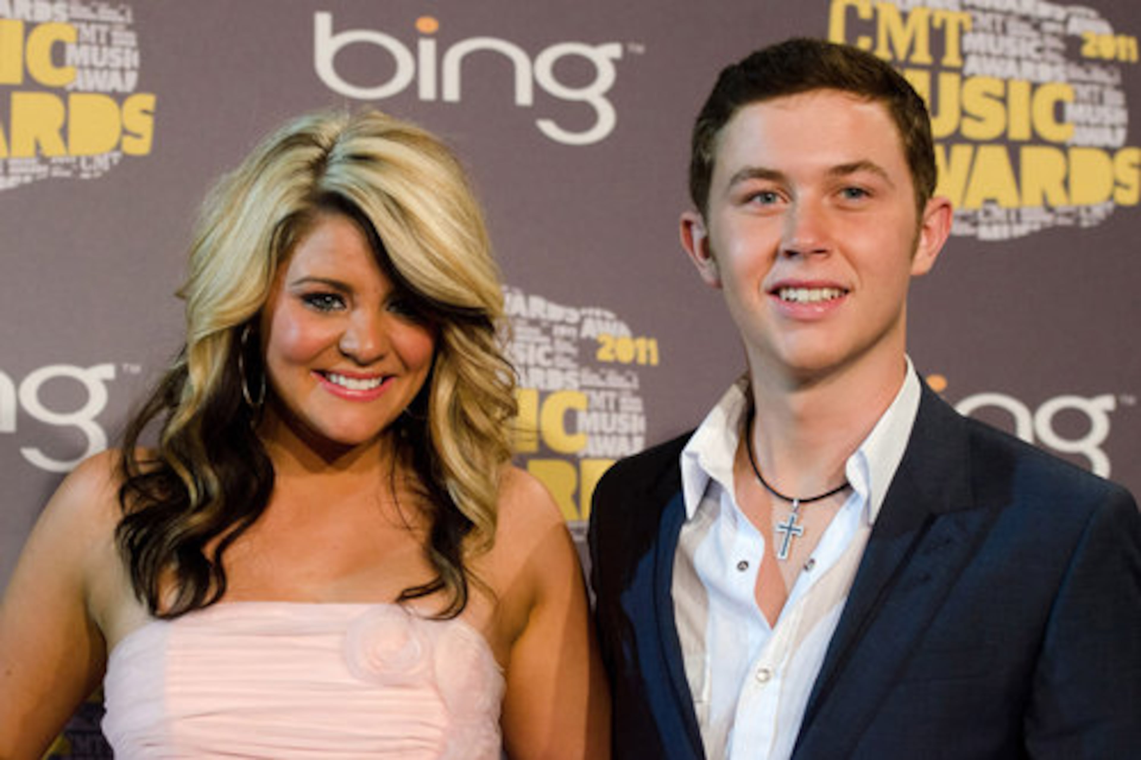 "American Idol" runner-up Lauren Alaina and winner Scotty McCreery appear backstage at the awards show.
