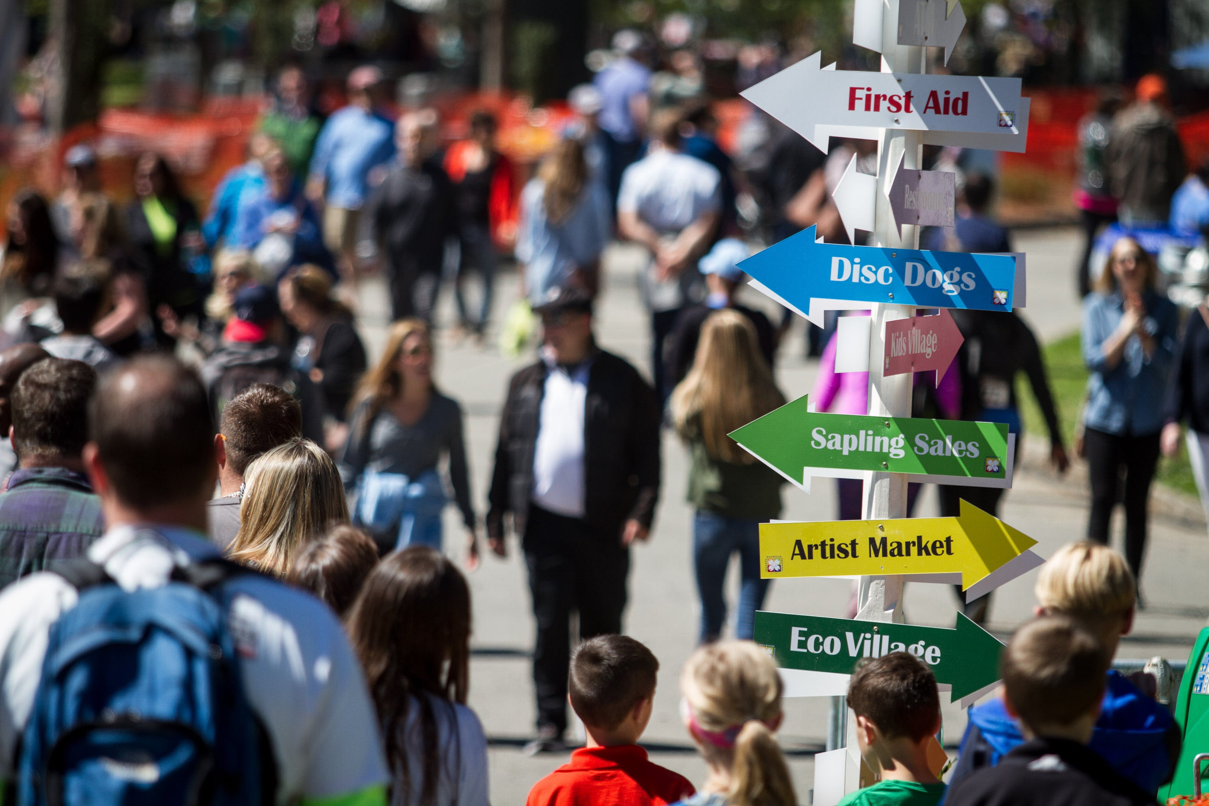 A sign points the way to the many available activities during the 81st Annual Atlanta Dogwood Festival Saturday in Atlanta, Ga April 8, 2017. STEVE SCHAEFER / SPECIAL TO THE AJC