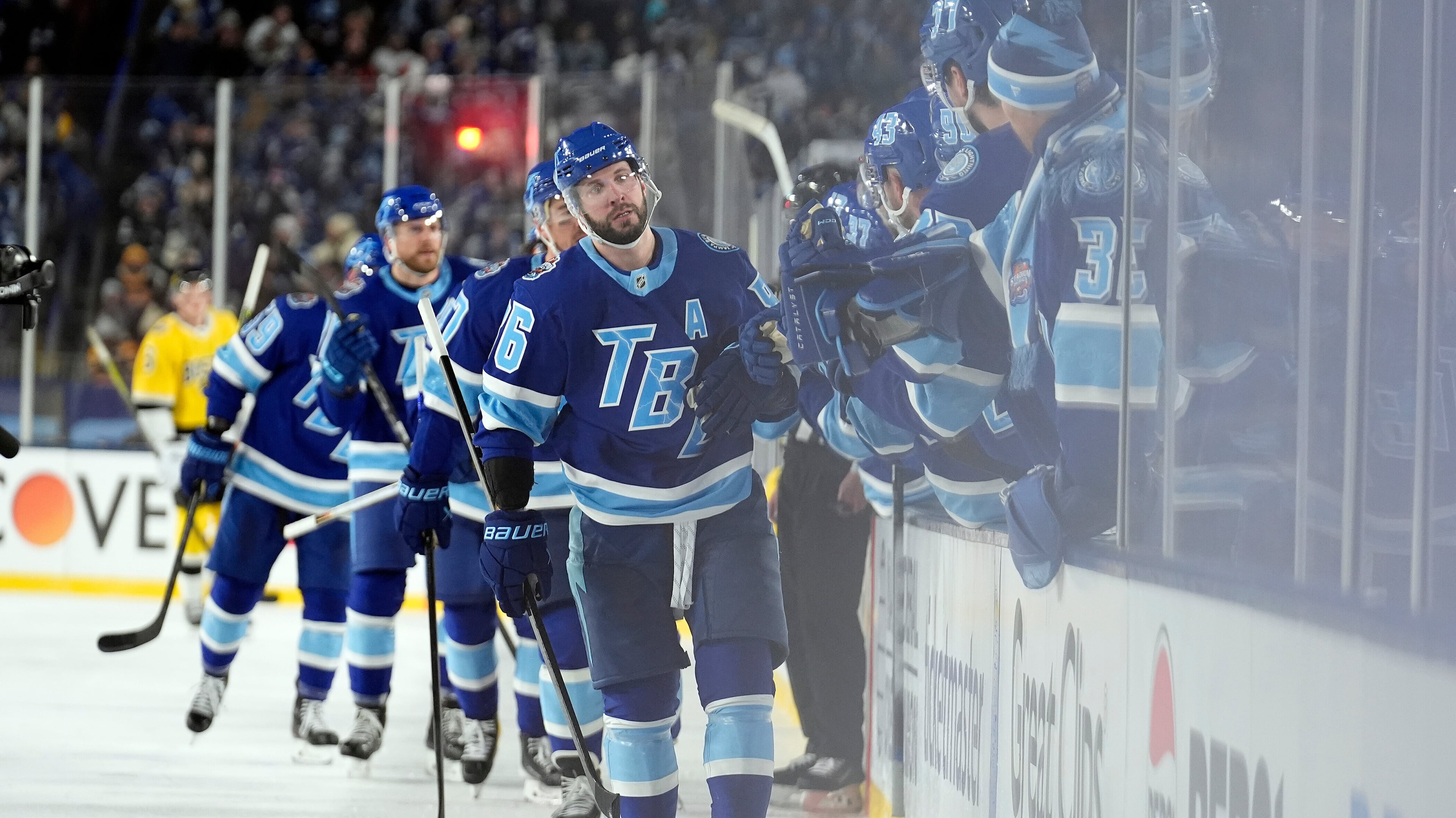 Tampa Bay Lightning right wing Nikita Kucherov (86) celebrates with the bench after his goal against the Boston Bruins during the thirdd period of a Stadium Series NHL hockey game Sunday, Feb. 1, 2026, in Tampa, Fla. (AP Photo/Chris O'Meara)