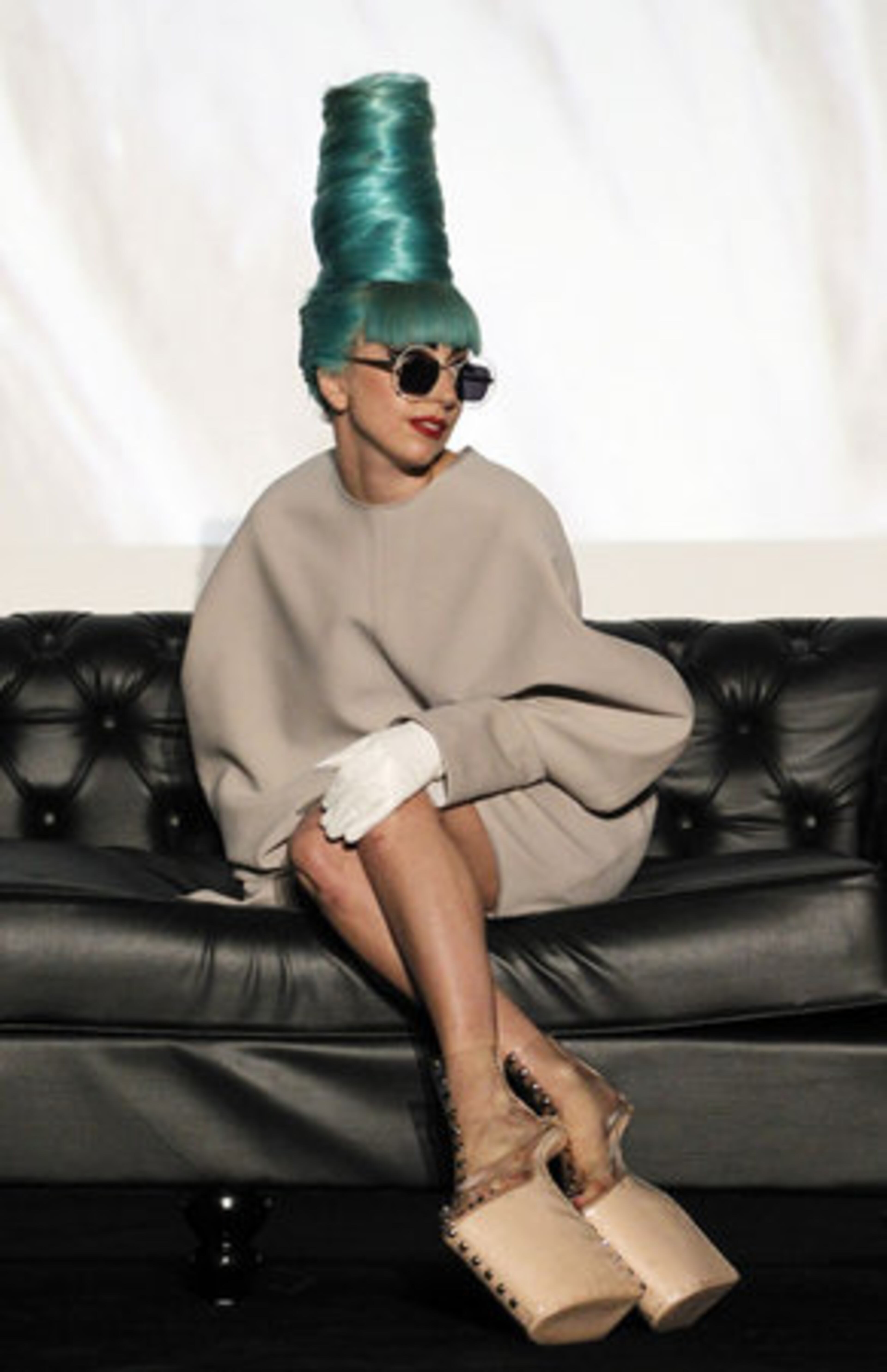 Why would Lady Gaga do anything else but sit in those heels?