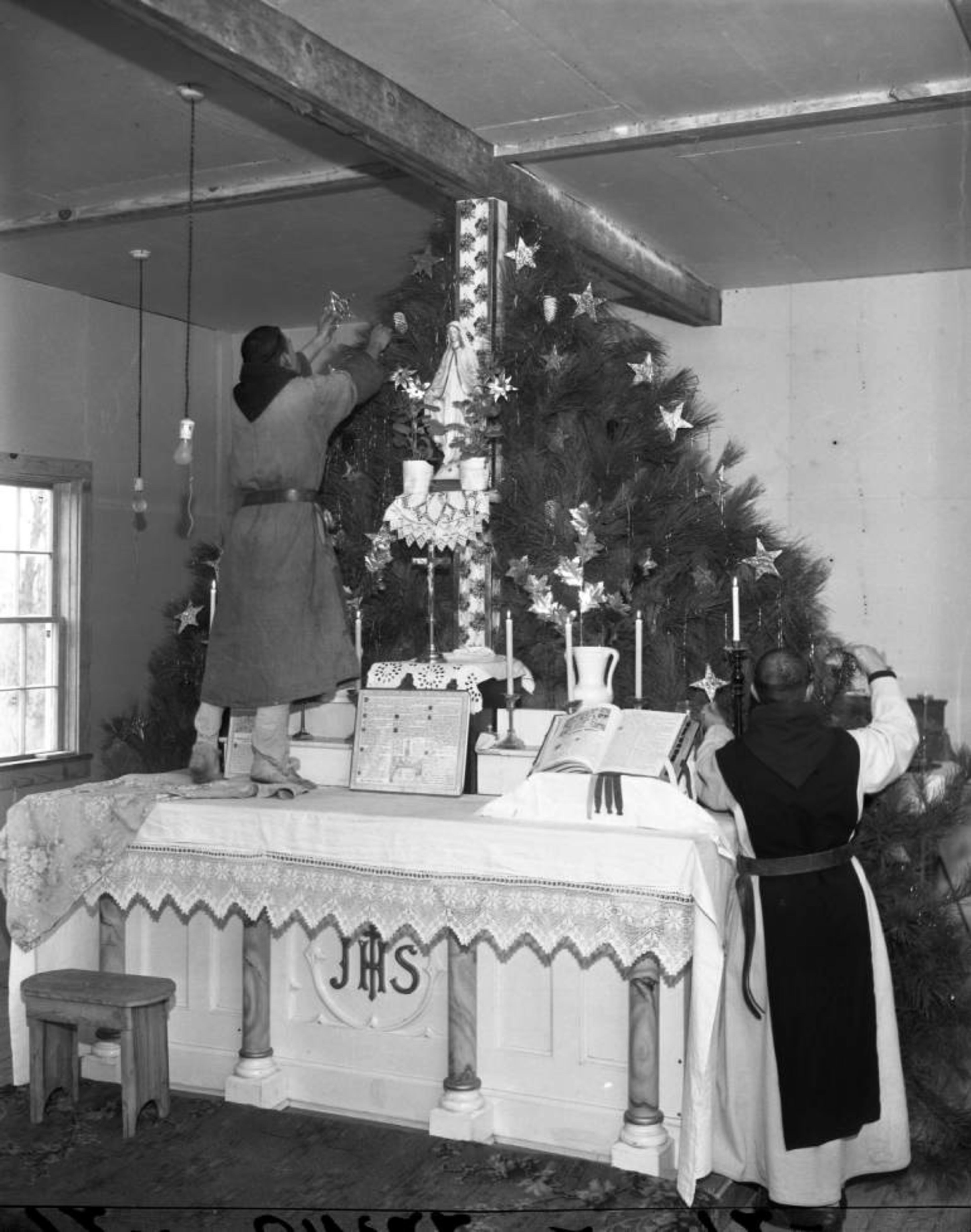 Trappist monks setting up their monastery near Conyers on March 23, 1944. As the website reads today, "In 1944, twenty one Trappist monks left Gethsemani Abbey in Kentucky and embarked on a journey similar to those originating in early Christianity. The trip led them to the wilderness of rural Georgia where they founded the Monastery of the Holy Spirit."
