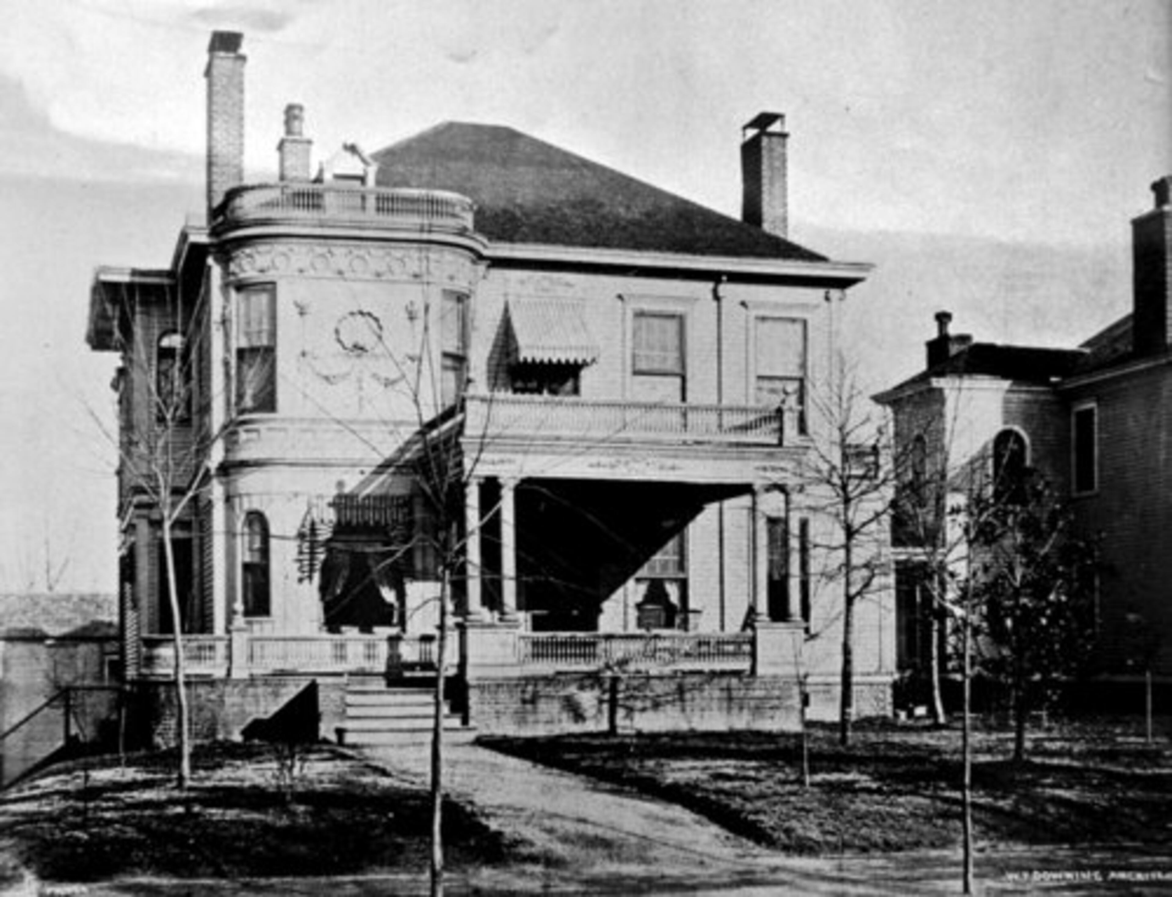 Dr. William P. Nicholson had the house built around 1891 as a wedding present for his bride. Walter T. Downing was the architect -- an Atlantan whose designs included buildings at Oglethorpe University and Georgia Tech as well as homes for other prominent Atlantans. When the house was built, it was sited as far as you could go and still be in the city of Atlanta. Nicholson family members remember fox hunting on the grounds.