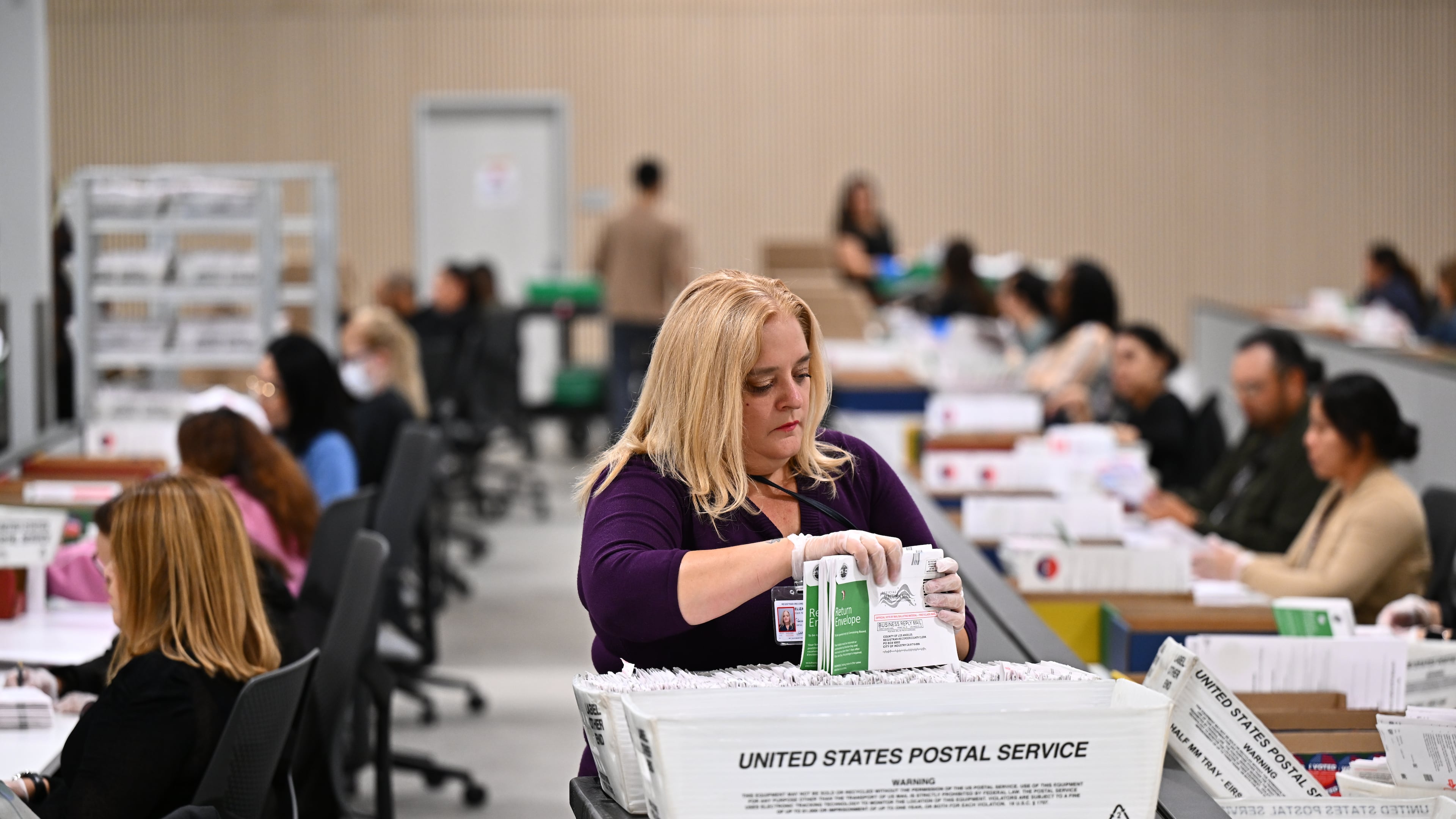 FILE - A worker sorts ballots at the L.A. County Ballot Processing Center during the California primary election, June 2, 2026, in City of Industry, Calif. (AP Photo/William Liang, File)
