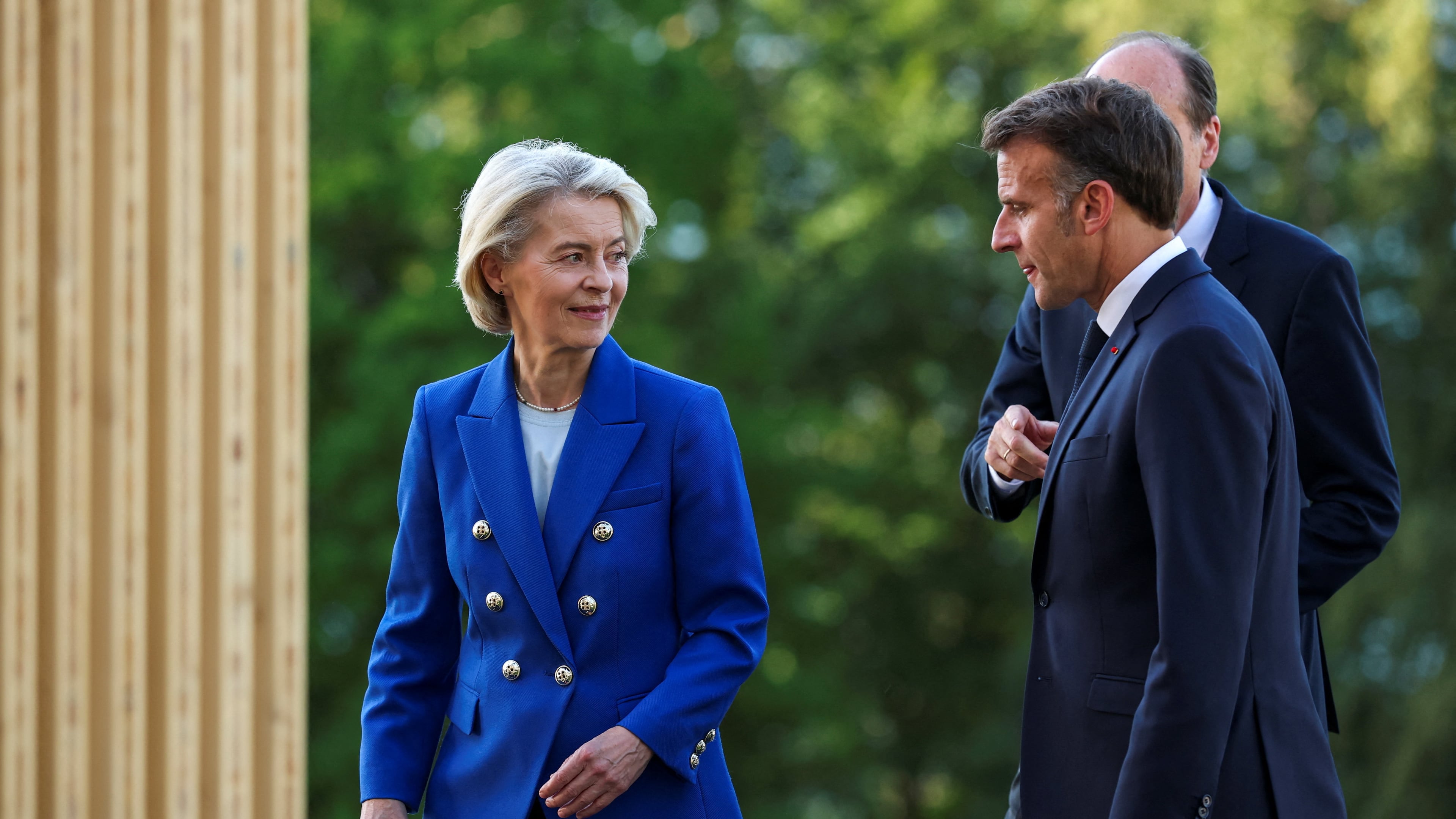 French President Emmanuel Macron walks with European Commission President Ursula von der Leyen during the G7 summit in Evian-les-Bains, France, Monday, June 15, 2026. (Isabel Infantes/Pool Photo via AP)