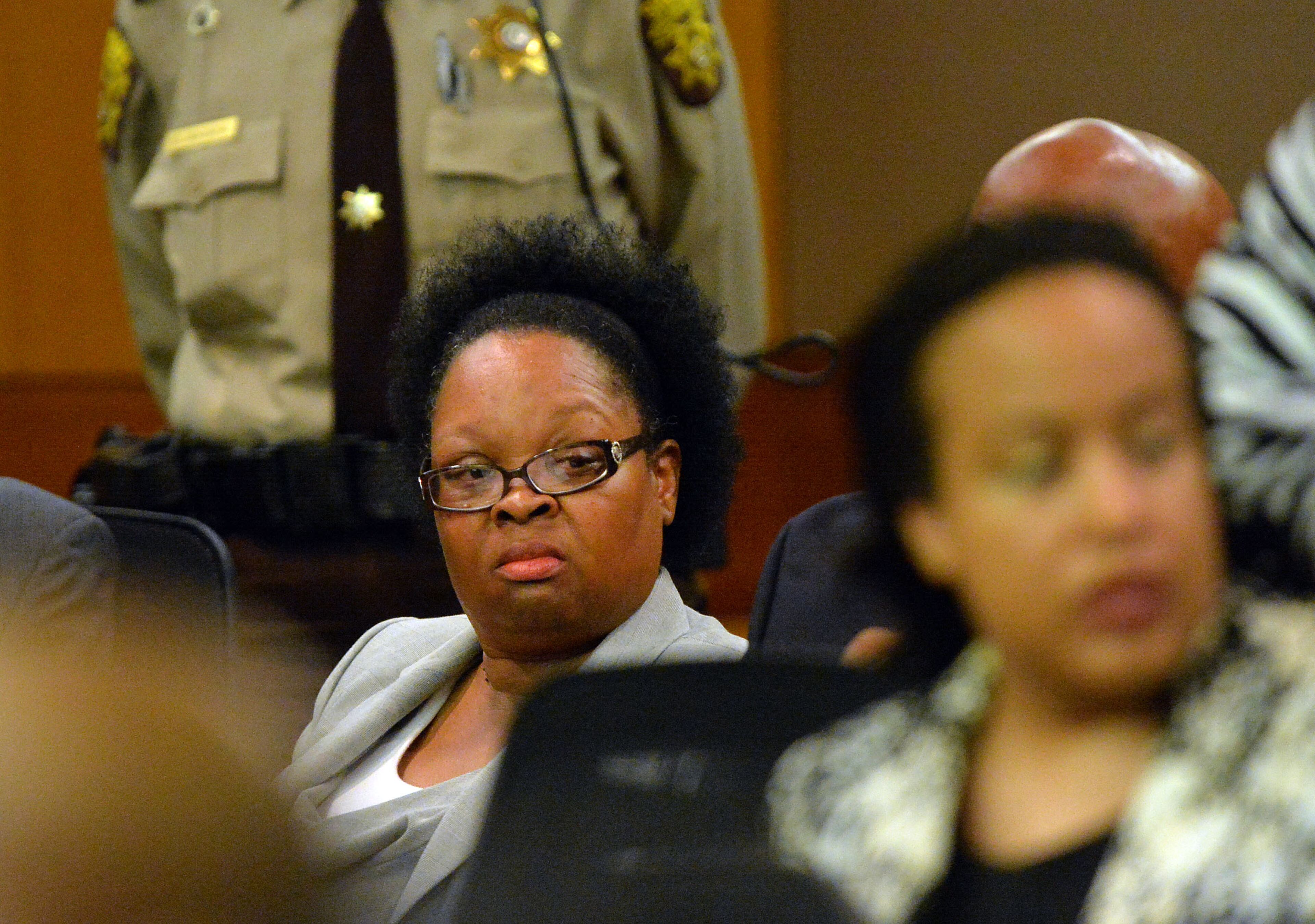 Former APS Dunbar Elementary teacher Diane Buckner-Webb listens during sentencing. Sentencing continues for 10 of the 11 defendants convicted of racketeering and other charges in the Atlanta Public Schools test-cheating trial before Judge Jerry Baxter in Fulton County Superior Court, Tuesday, April 14, 2015. (Atlanta Journal-Constitution, Kent D. Johnson, Pool)