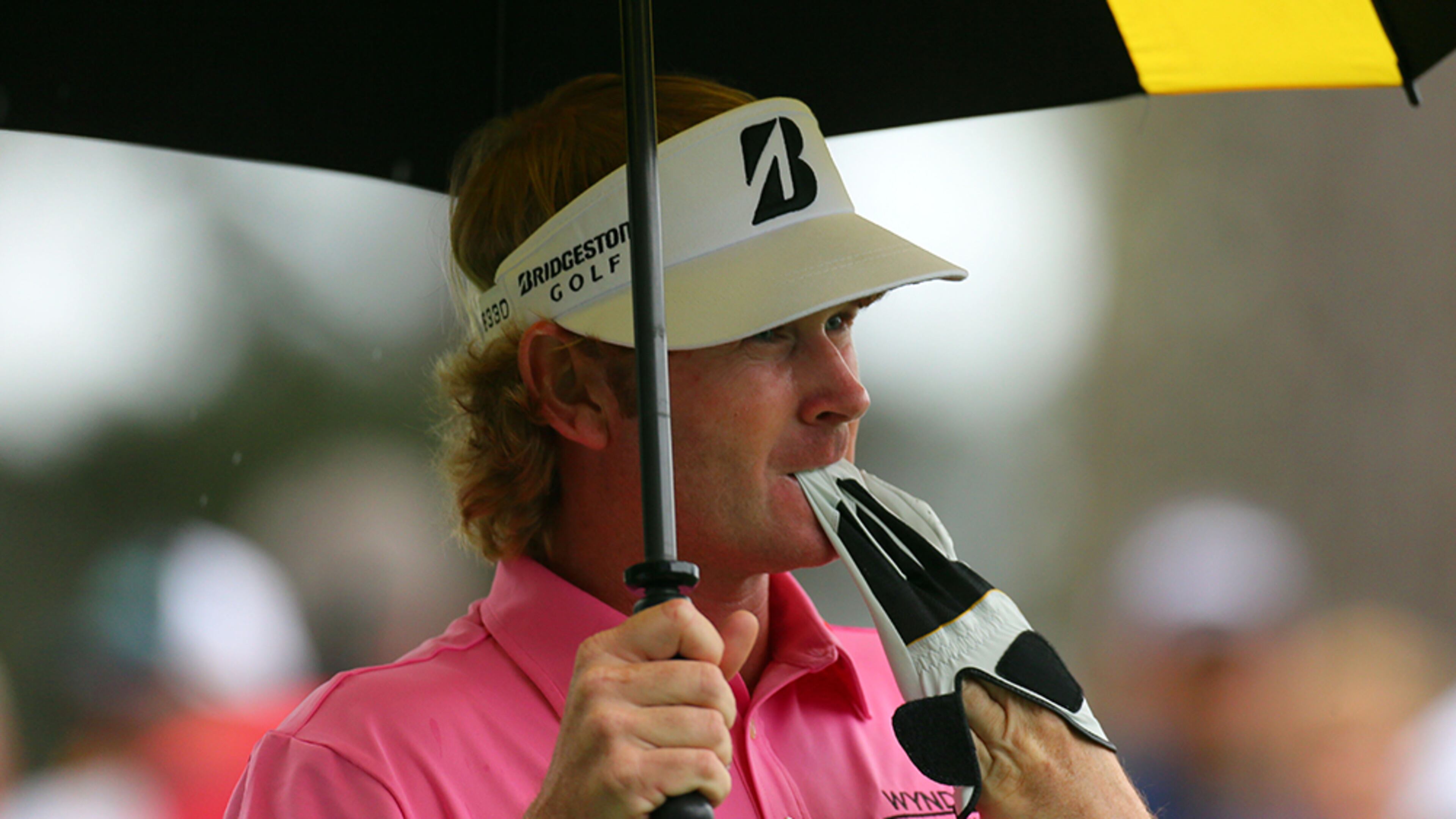 Brandt Snedeker pulls off his glove after hitting his shot short from the No. 4 tee during the final round in the Masters Tournament at Augusta National Golf Club.