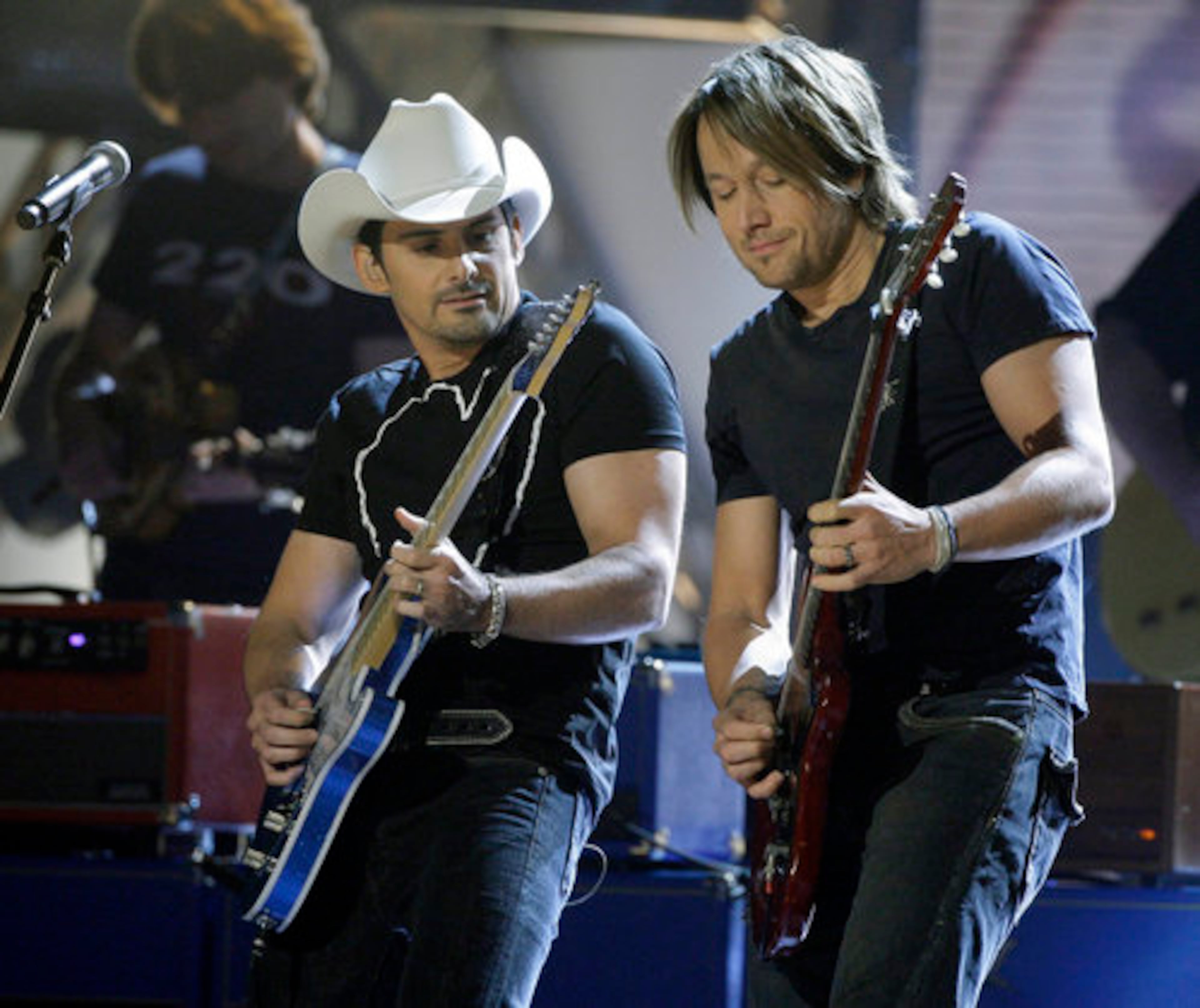 Brad Paisley and Keith Urban perform "Start a Band" to open the 42nd annual CMA Awards on Nov. 12, 2008, in Nashville, Tenn.