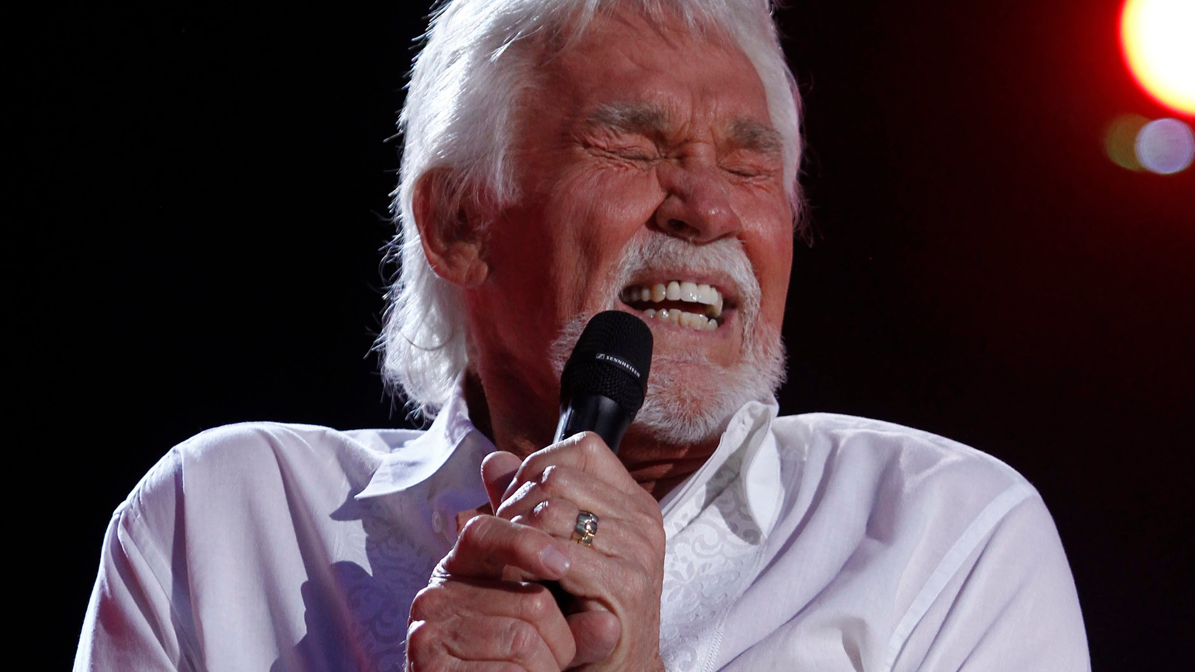 FILE - In this June 9, 2012, file photo, Kenny Rogers performs at the 2012 CMA Music Festival in Nashville, Tenn. Actor-singer Kenny Rogers, the smooth, Grammy-winning balladeer who spanned jazz, folk, country and pop with such hits as âLucille,â âLadyâ and âIslands in the Streamâ and embraced his persona as âThe Gamblerâ on record and on TV died Friday night, March 20, 2020. He was 81. (Photo by Wade Payne/Invision/AP, File)