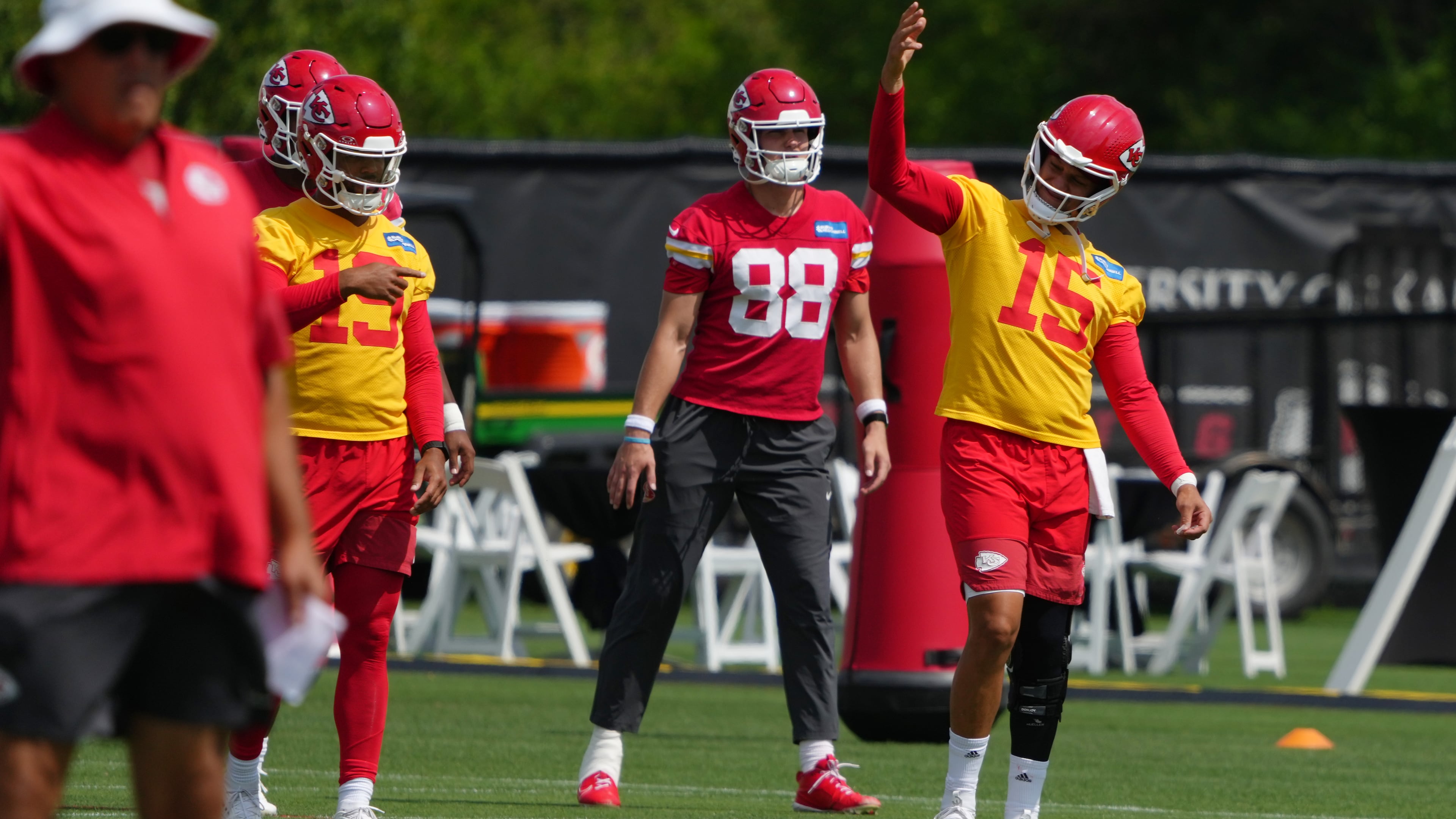 Kansas City Chiefs quarterback Patrick Mahomes (15) signals teammates during the NFL football team's practice Wednesday, June 10, 2026, in Kansas City, Mo. (AP Photo/Ed Zurga)