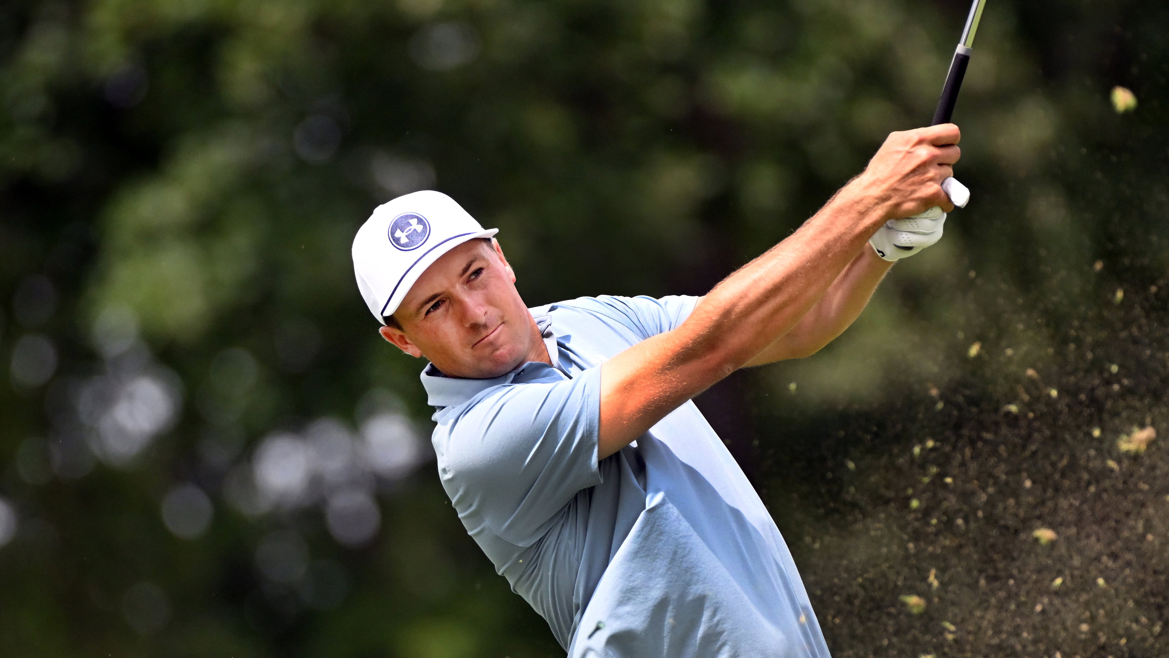 Jordan Spieth hits from the ninth tee during the first round of the Rocket Classic golf tournament at the Detroit Golf Club, Thursday, July 30, 2026, in Detroit. (AP Photo/Jose Juarez)