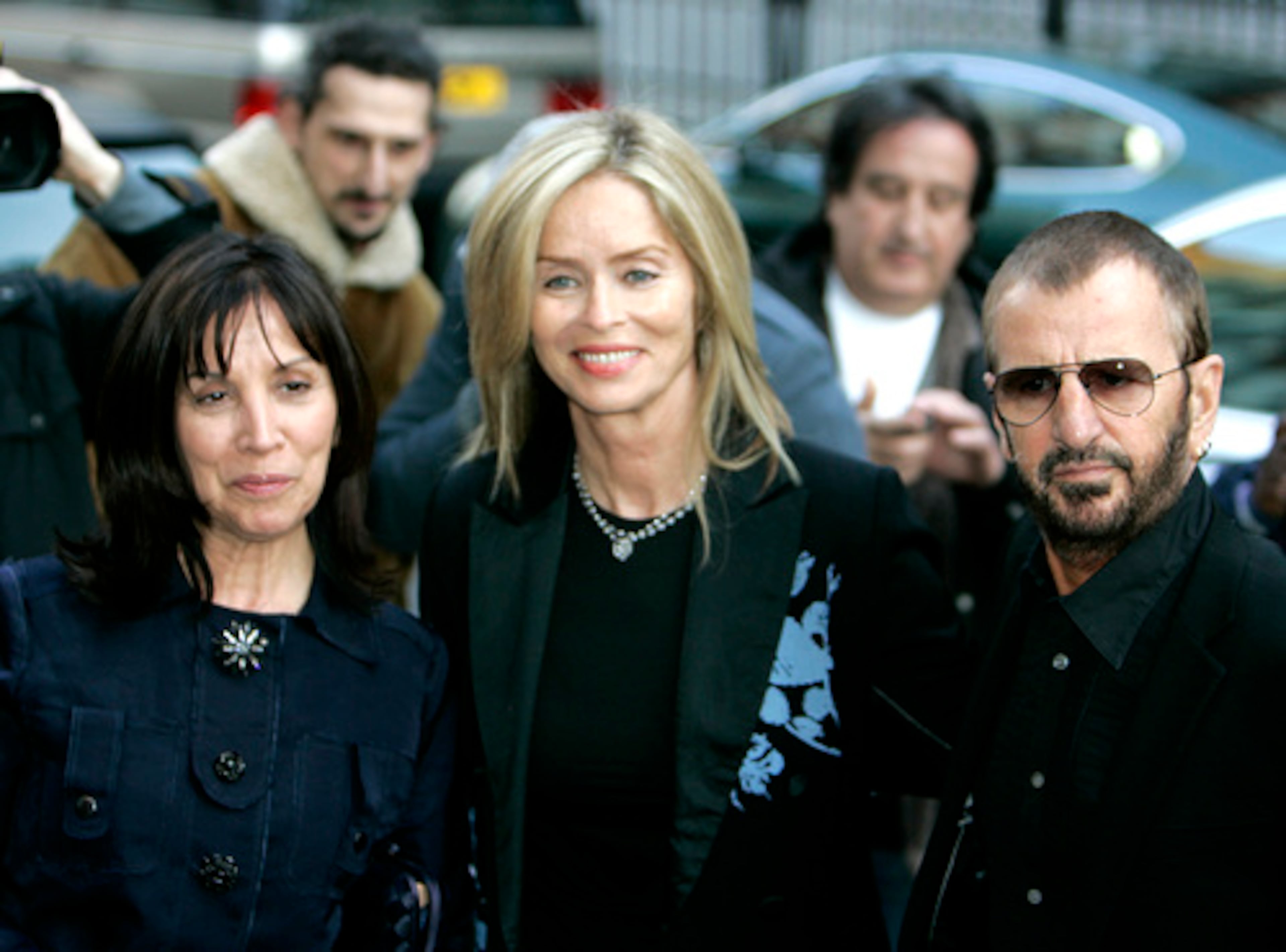 FORMER BEATLE Ringo Starr (right) arrives with his wife, actress Barbara Bach (center) and Olivia Harrison, widow of George Harrison.