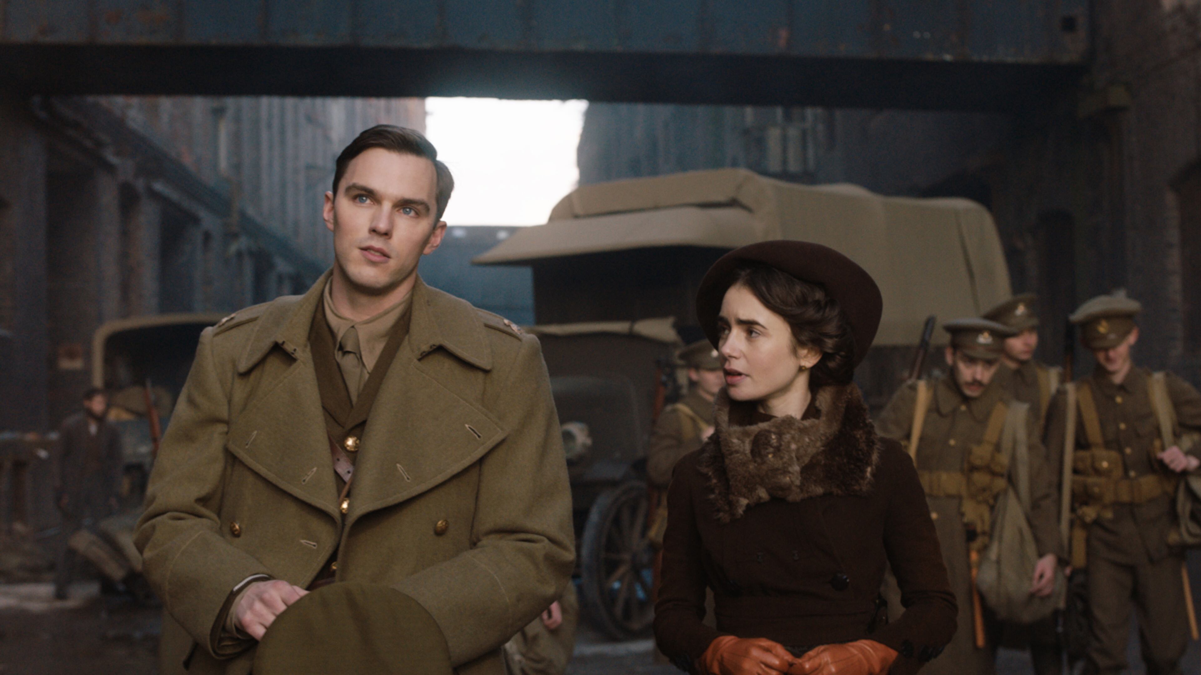 Nicholas Hoult, left, and Lily Collins star in “Tolkien.” Fox Searchlight Pictures