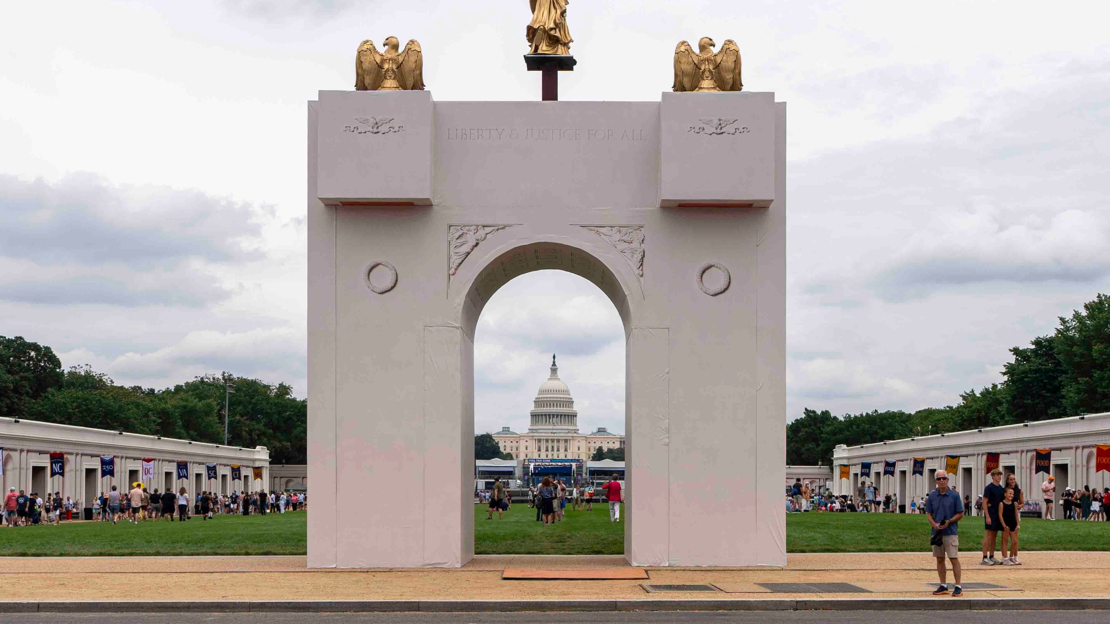 FILE - A mockup of President Donald Trump's proposed triumphal arch stands at the Great American State Fair on the National Mall, June 27, 2026, in Washington. (AP Photo/Jen Golbeck, File)