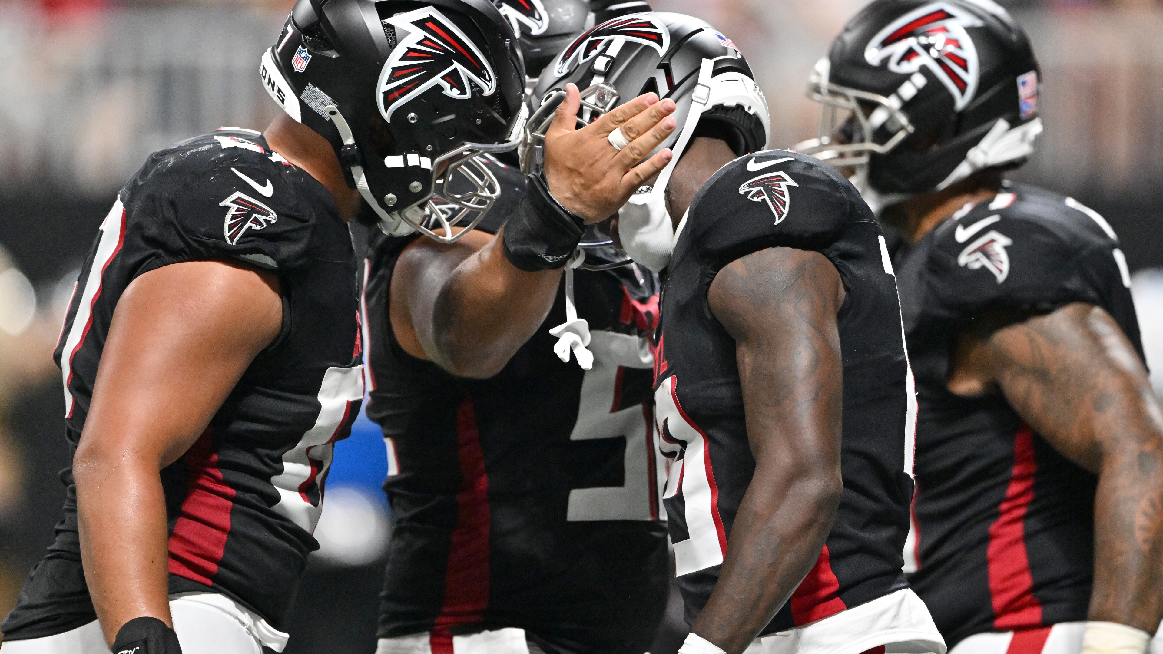 Atlanta Falcons wide receiver Chris Blair celebrates with teammates after scoring a touchdown during the second half of an NFL preseason game at Mercedes-Benz Stadium, Friday, Aug. 15, 2025, in Atlanta (Hyosub Shin/AJC)