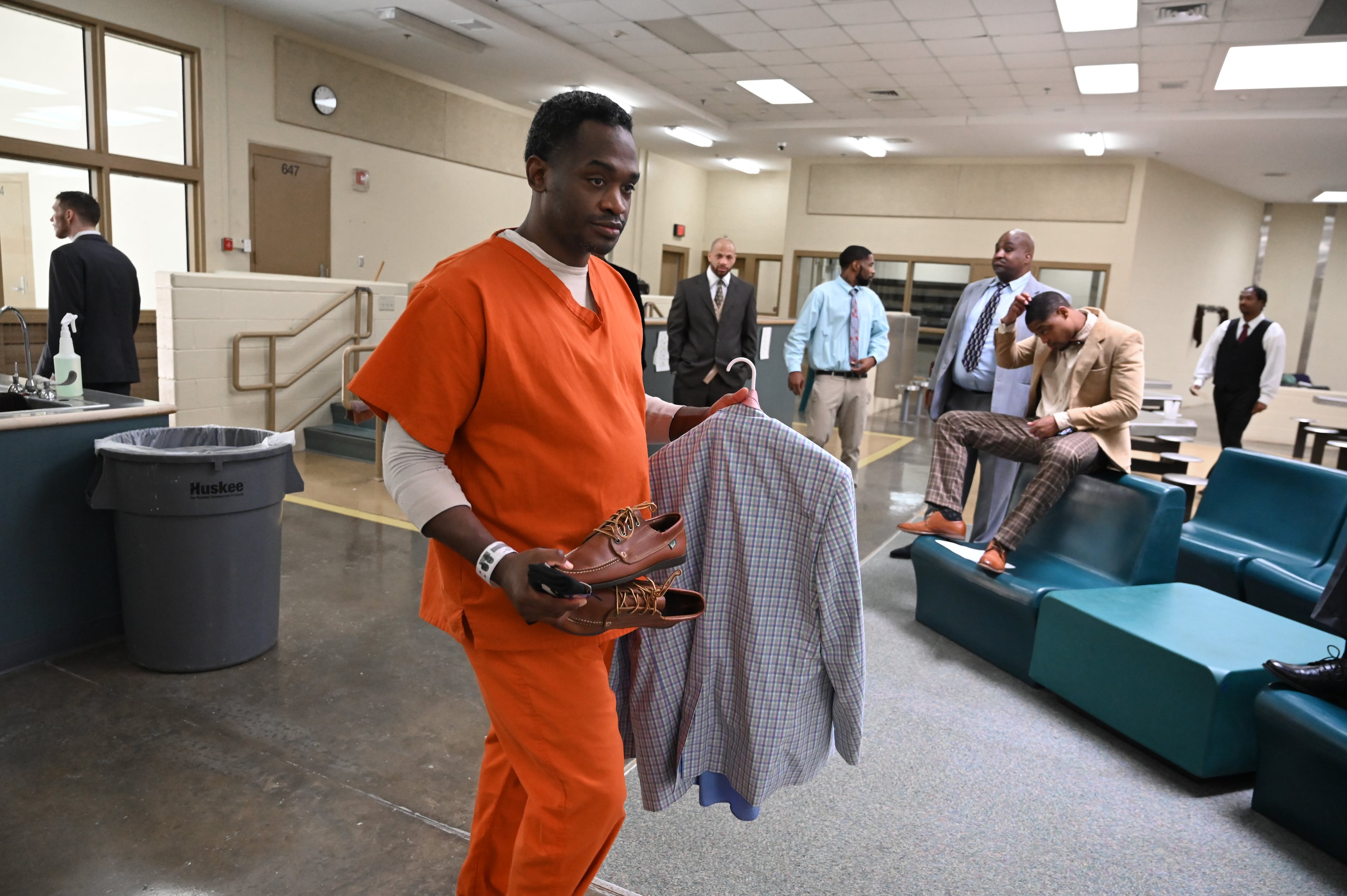 Darryl Fitch gets ready to change into a suit before a graduation ceremony for the Re-Entry Success Program at the Athens-Clarke County Jail on Wednesday, June 18, 2025, in Athens. (Hyosub Shin/AJC)