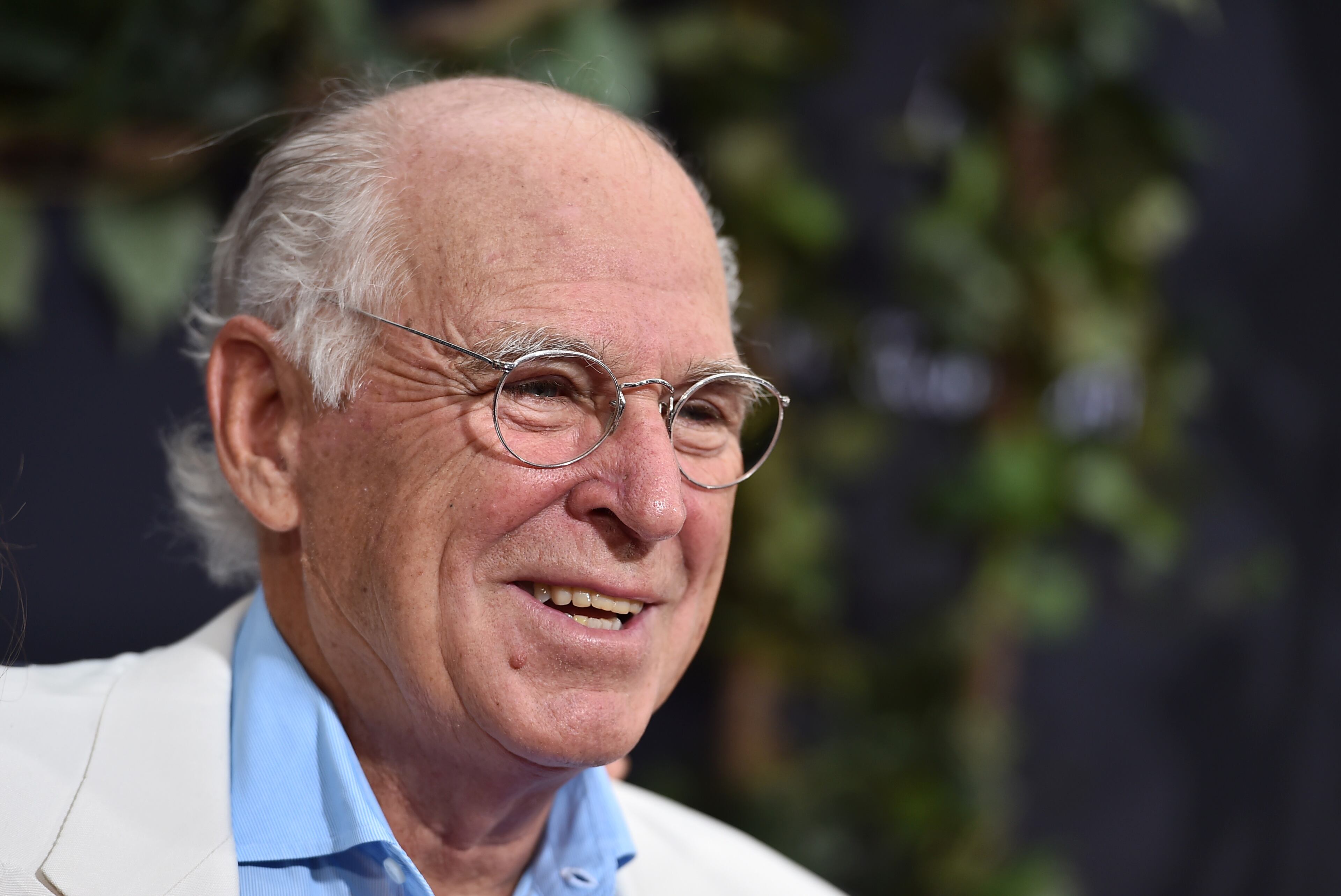 Jimmy Buffett arrives at the Los Angeles premiere of "Jurassic World" at the Dolby Theatre on Tuesday, June 9, 2015. (Photo by Jordan Strauss/Invision/AP)