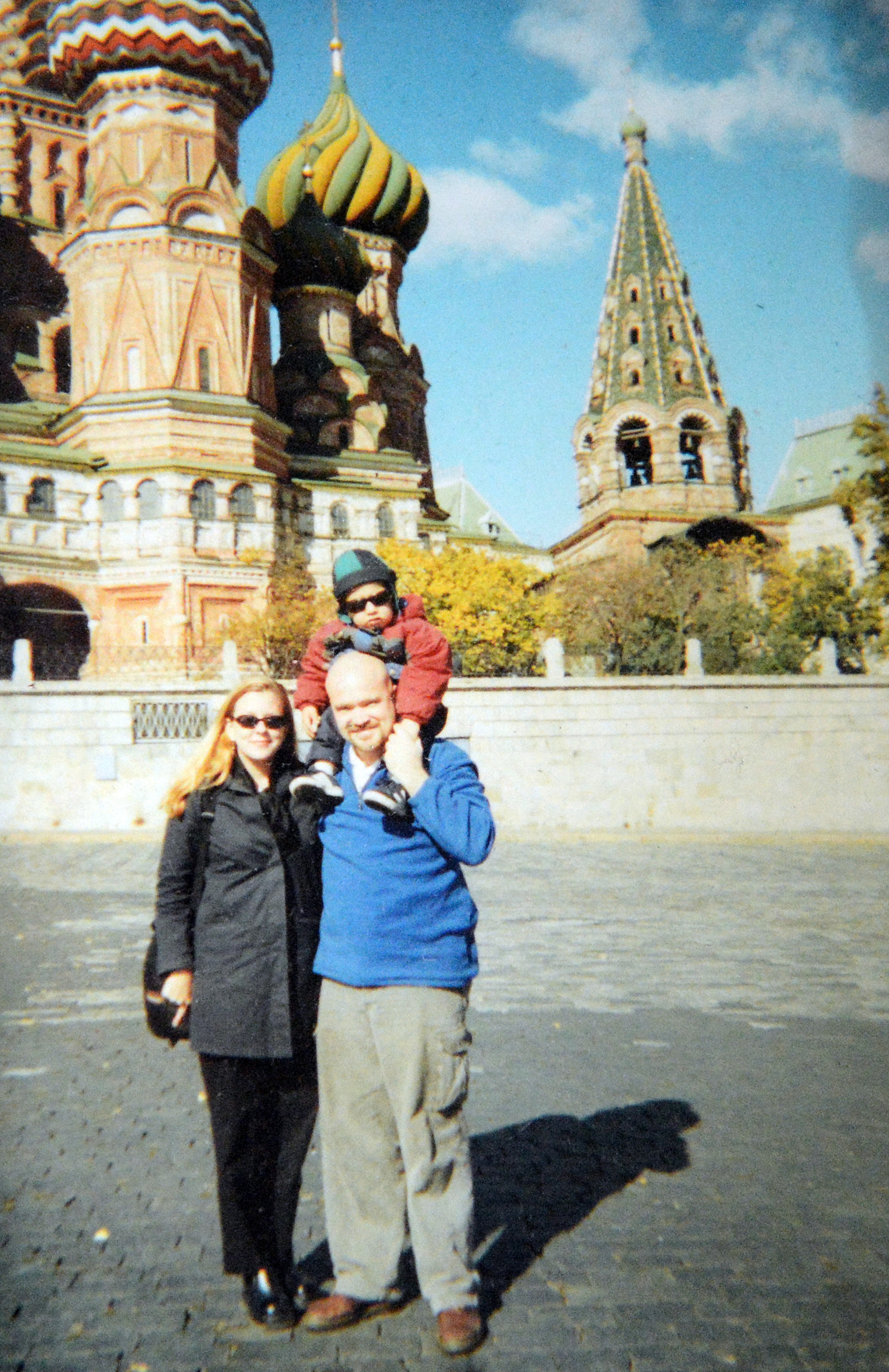 The new family poses for a quick snapshot in front of St. Basil's Cathedral. Having already spent a month in Perm, the Waterhouses were too burned out from their ordeal to tour Red Square.