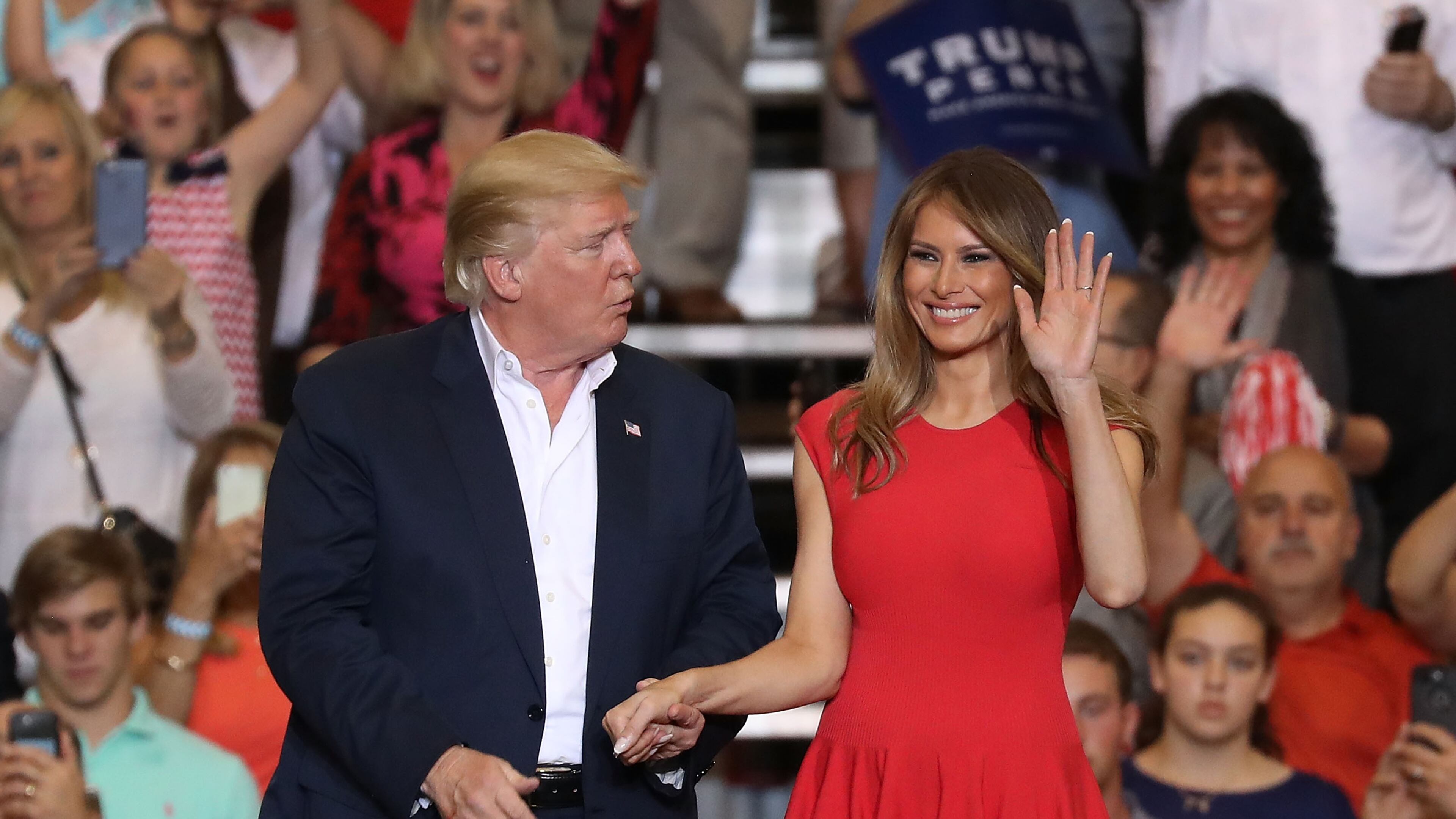 MELBOURNE, FL - FEBRUARY 18: President Donald Trump and Melania Trump stand together during a campaign rally at the AeroMod International hangar at Orlando Melbourne International Airport on February 18, 2017 in Melbourne, Florida. (Photo by Joe Raedle/Getty Images)