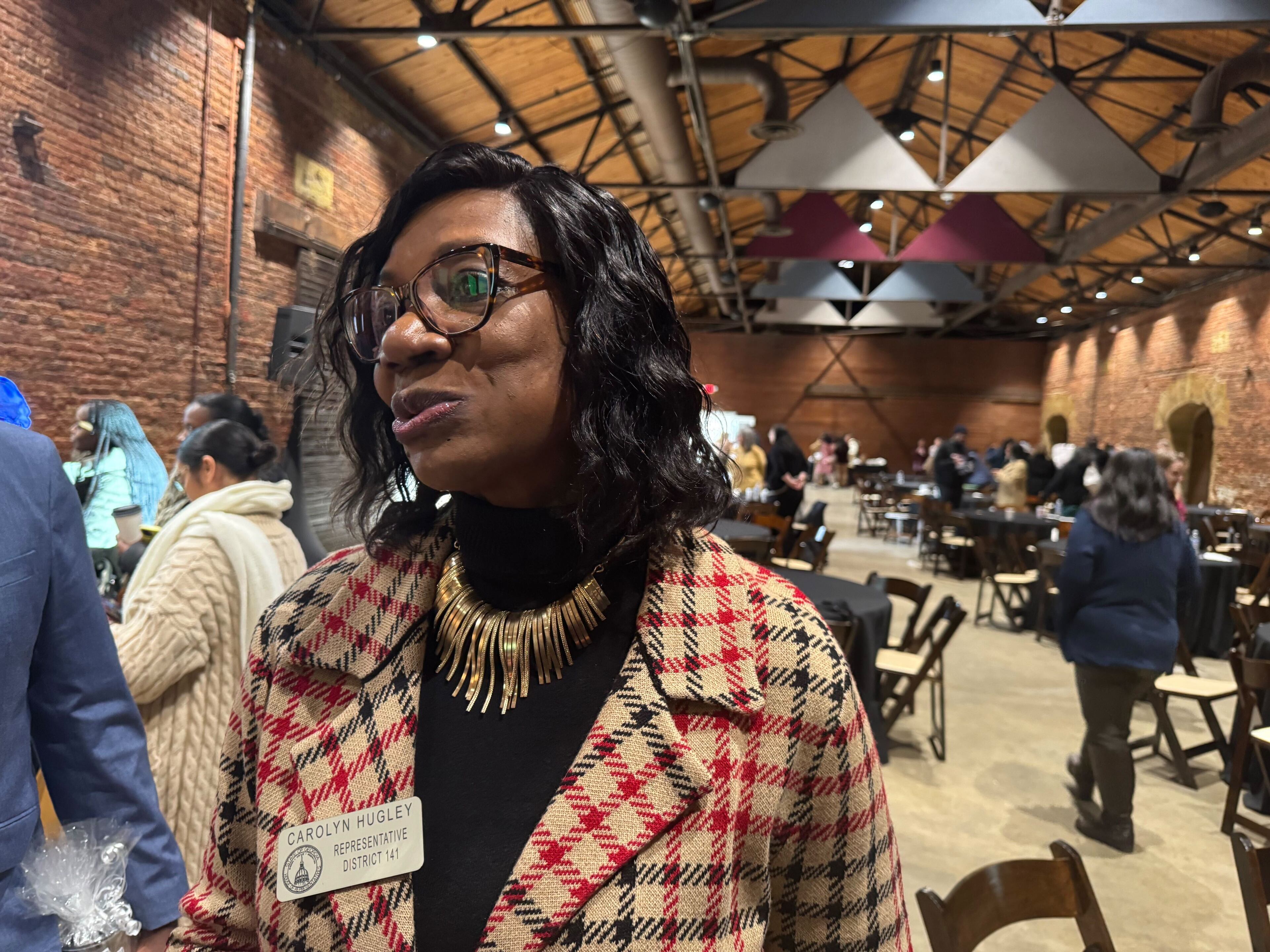 Georgia House Minority Leader Carolyn Hugley, a Democrat from Columbus, speaks with reporters in Atlanta on Wednesday.
