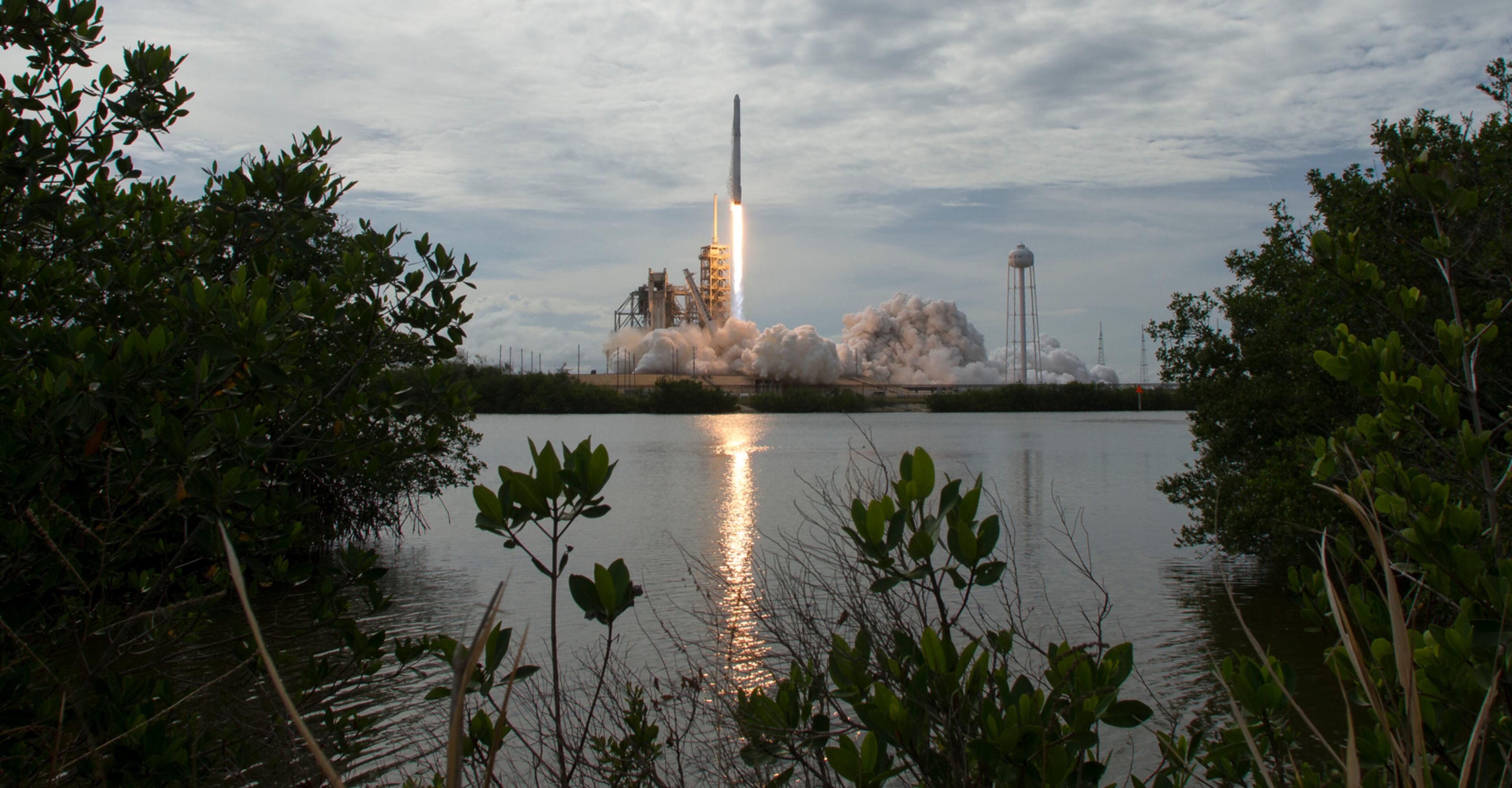 In this photo provided by NASA, the SpaceX Falcon 9 rocket, with the Dragon spacecraft onboard, launches from pad 39A at NASA's Kennedy Space Center in Cape Canaveral, Fla, Saturday, June 3, 2017. SpaceX launched its first recycled cargo ship to the International Space Station on Saturday, yet another milestone in its bid to drive down flight costs. (Bill Ingalls/NASA via AP)