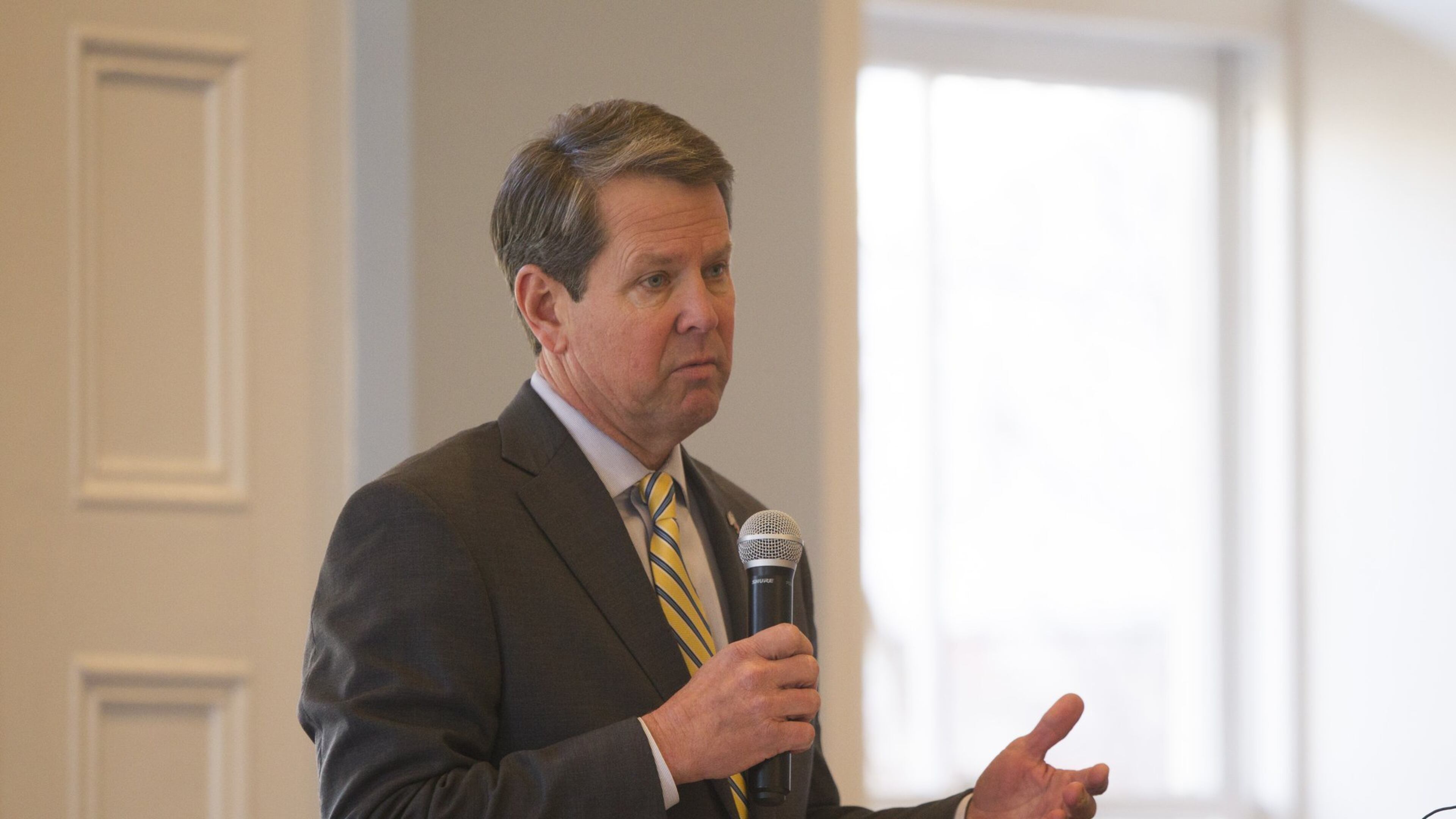 Secretary of State Brian Kemp addresses the public during a transportation policy forum at the Georgia Freight Depot in Atlanta, Georgia on Wednesday, Jan. 24, 2018. Kemp says lack of high-speed internet is a problem that puts many rural Georgians at a disadvantage. (REANN HUBER/REANN.HUBER@AJC.COM)