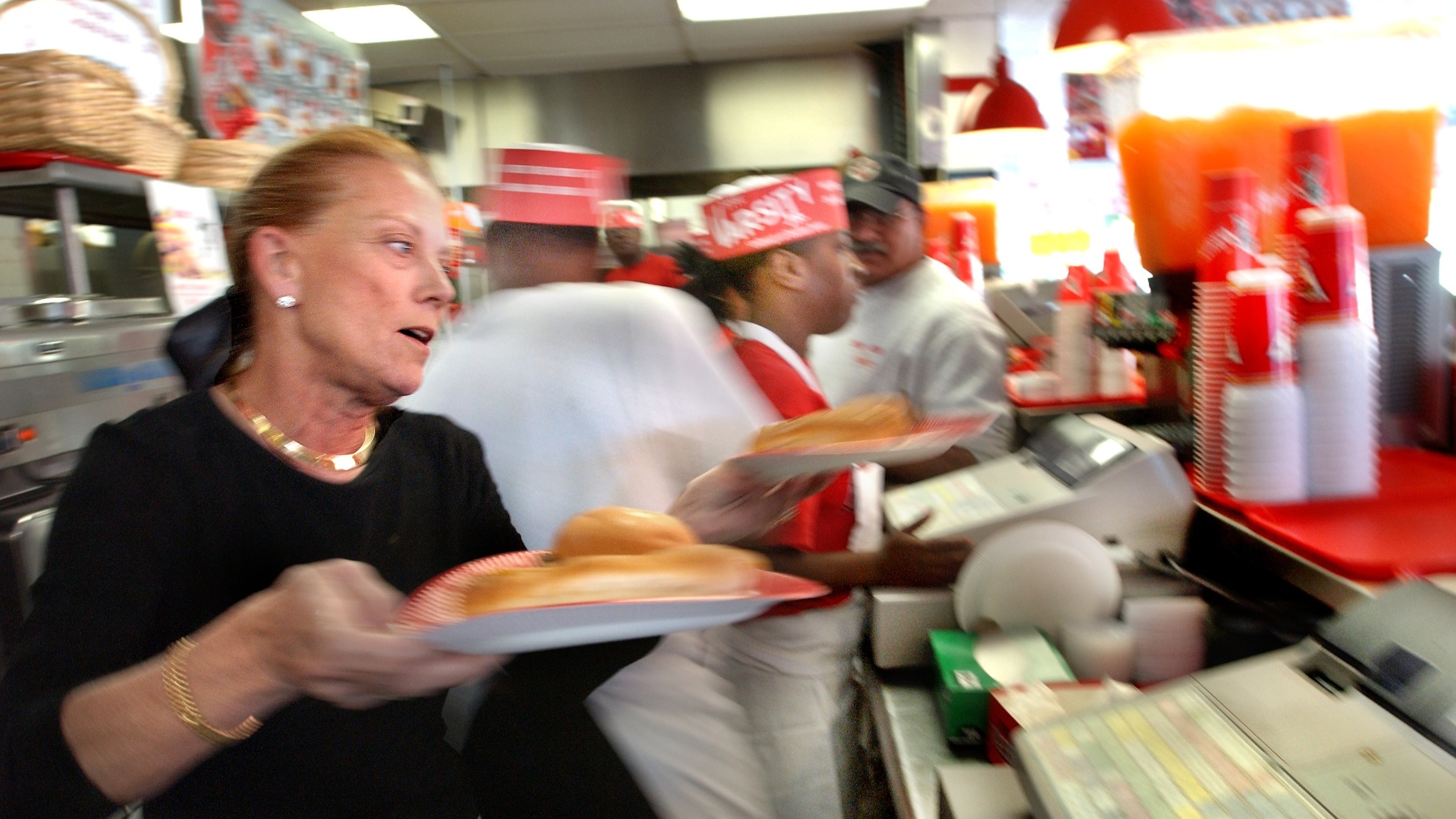 As the owner of the Varsity Jr., Susan Gordy (shown in 2003) would work behind the counter filling orders. She started running the Varsity Jr. in 1980, when her husband, Frank Gordy Jr., was killed. Susan Gordy, who retired in 2006, died Sept. 6 after a battle with breast cancer. AJC file photo / Joey Ivansco