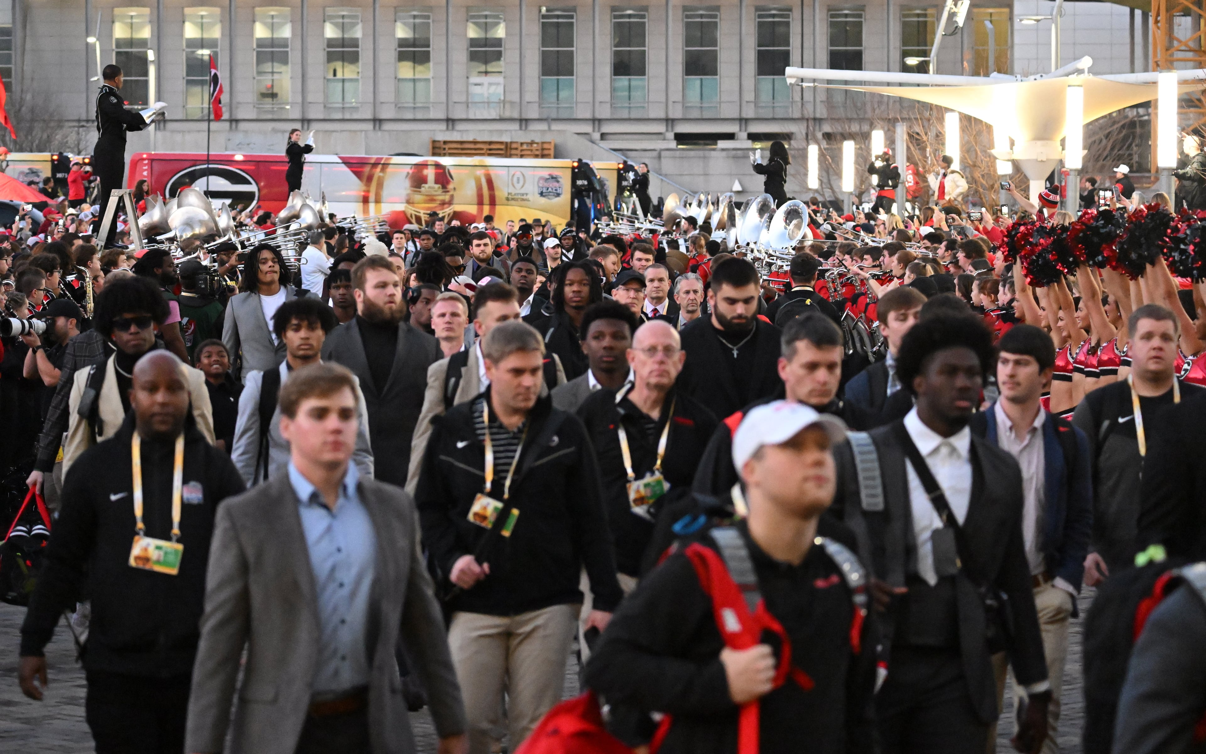 Georgia players and staff arrive during the Dawg Walk to play Ohio State in the 2022 CFP Semifinal at the Chick-fil-A Peach Bowl Saturday, Dec. 31, 2022, in Atlanta. (Hyosub Shin / Hyosub.Shin@ajc.com)