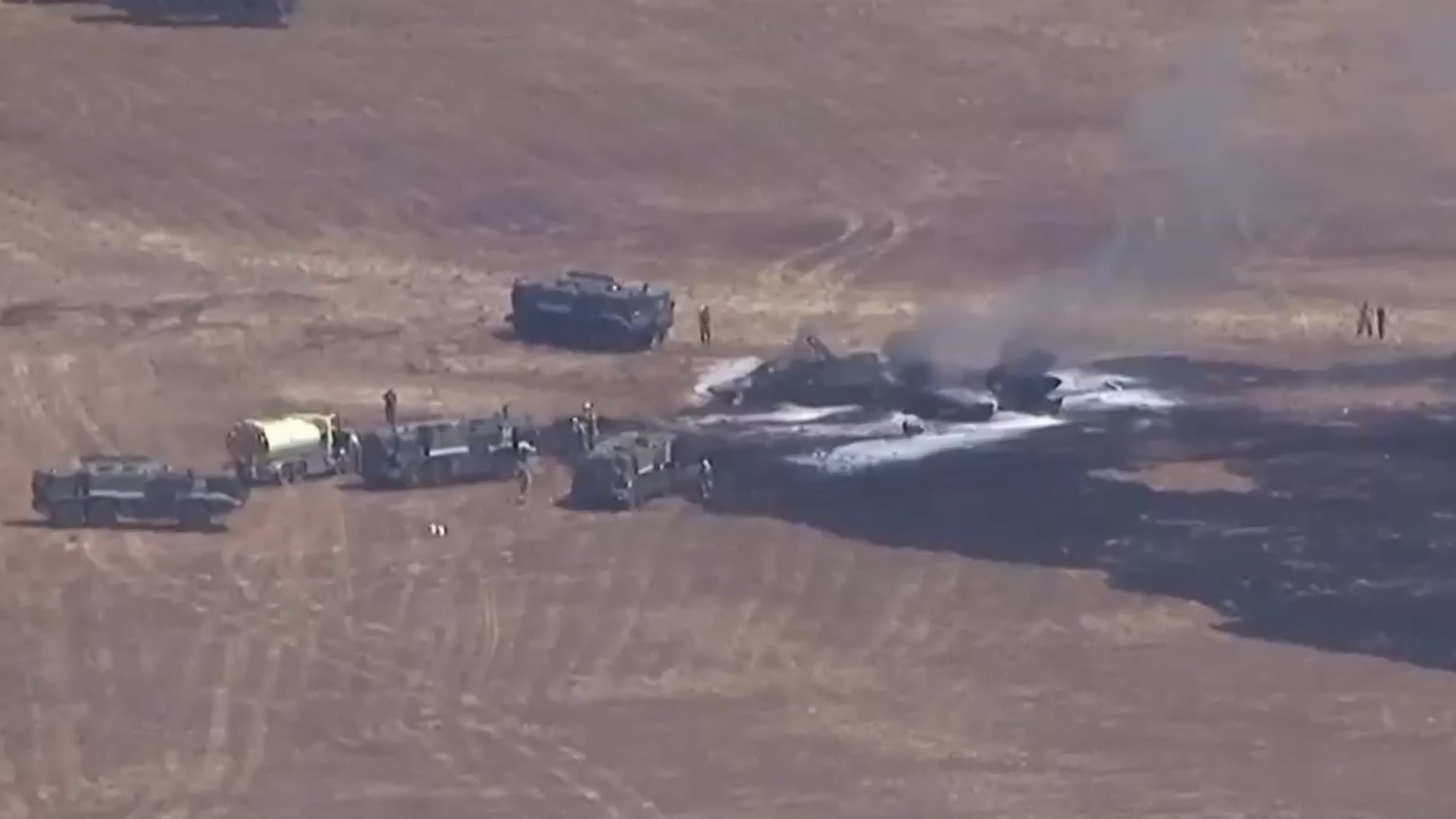 This image made from a video provided by KGTV shows the scene of an F-35 jet crash Friday, July 31, 2026, near the Miramar Air Base in San Diego. (KGTV via AP)