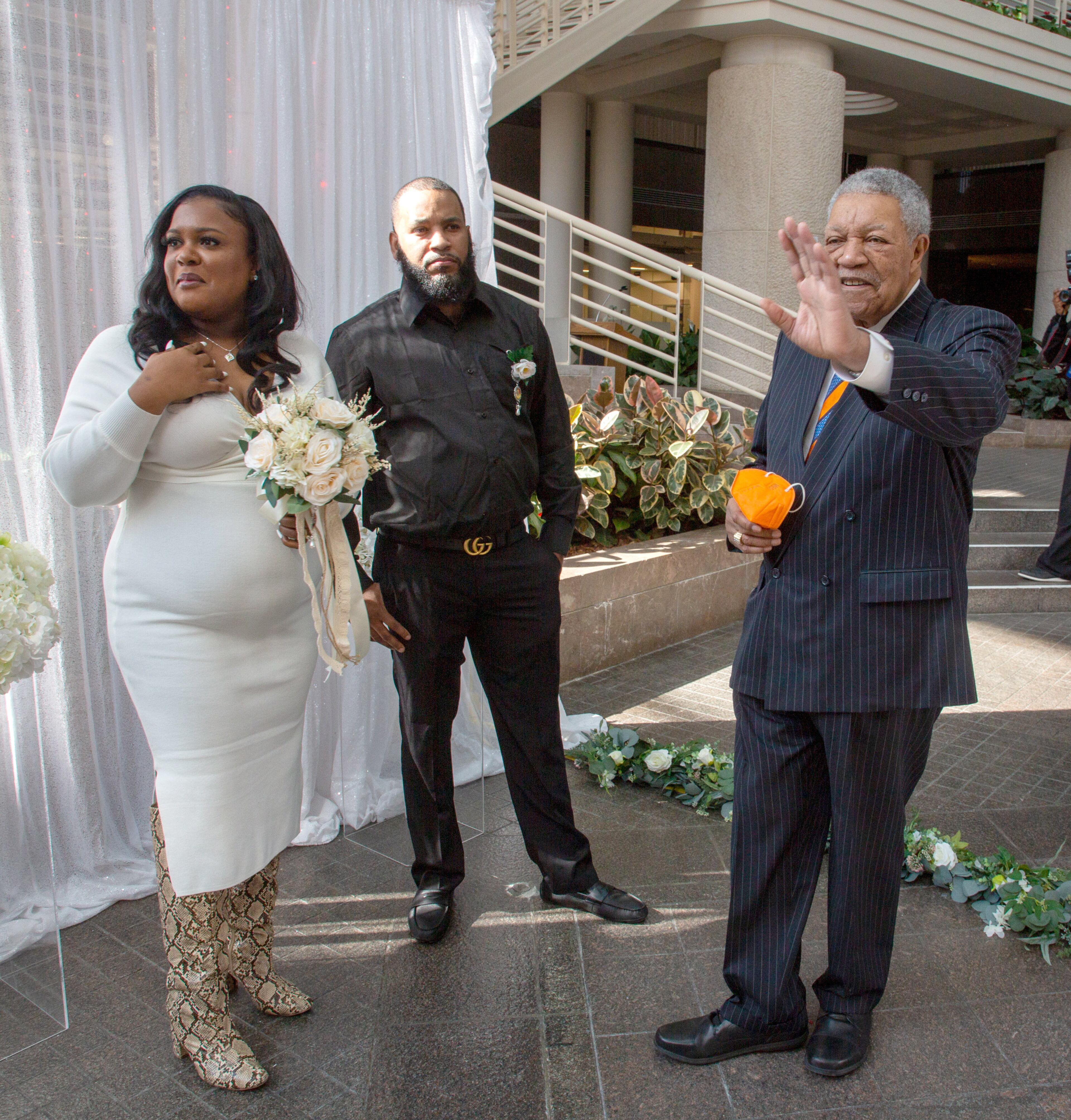 Shantia Robinson and her new husband Jonathan talk with the Chairman of the Board of Commissioners of Fulton County Robert Pitts after getting married in the Atrium of the Fulton County Gov. Bldg. on valentines day, February 14, 2022.
STEVE SCHAEFER FOR THE ATLANTA JOURNAL-CONSTITUTION
