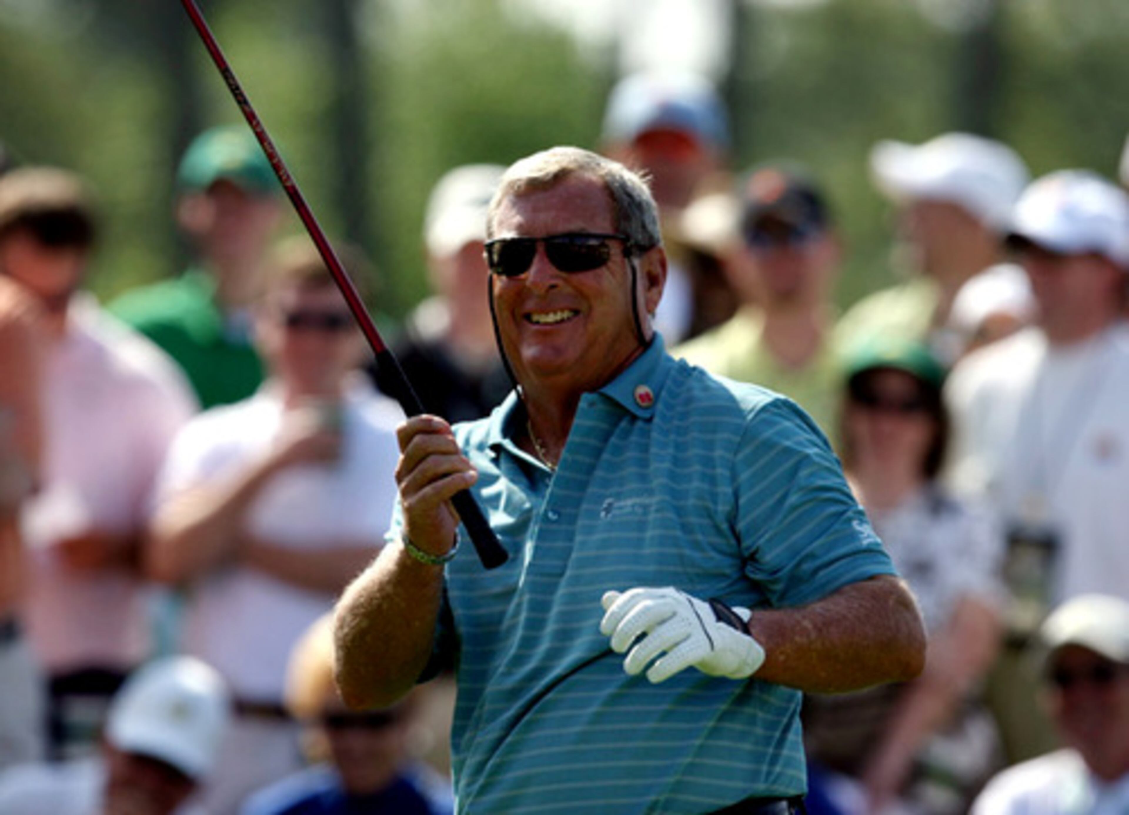 Well it's not Tiger but Fuzzy Zoeller is still a crowd favorite. The 1979 Masters winner goofs with the gallery before teeing off on hole 8.