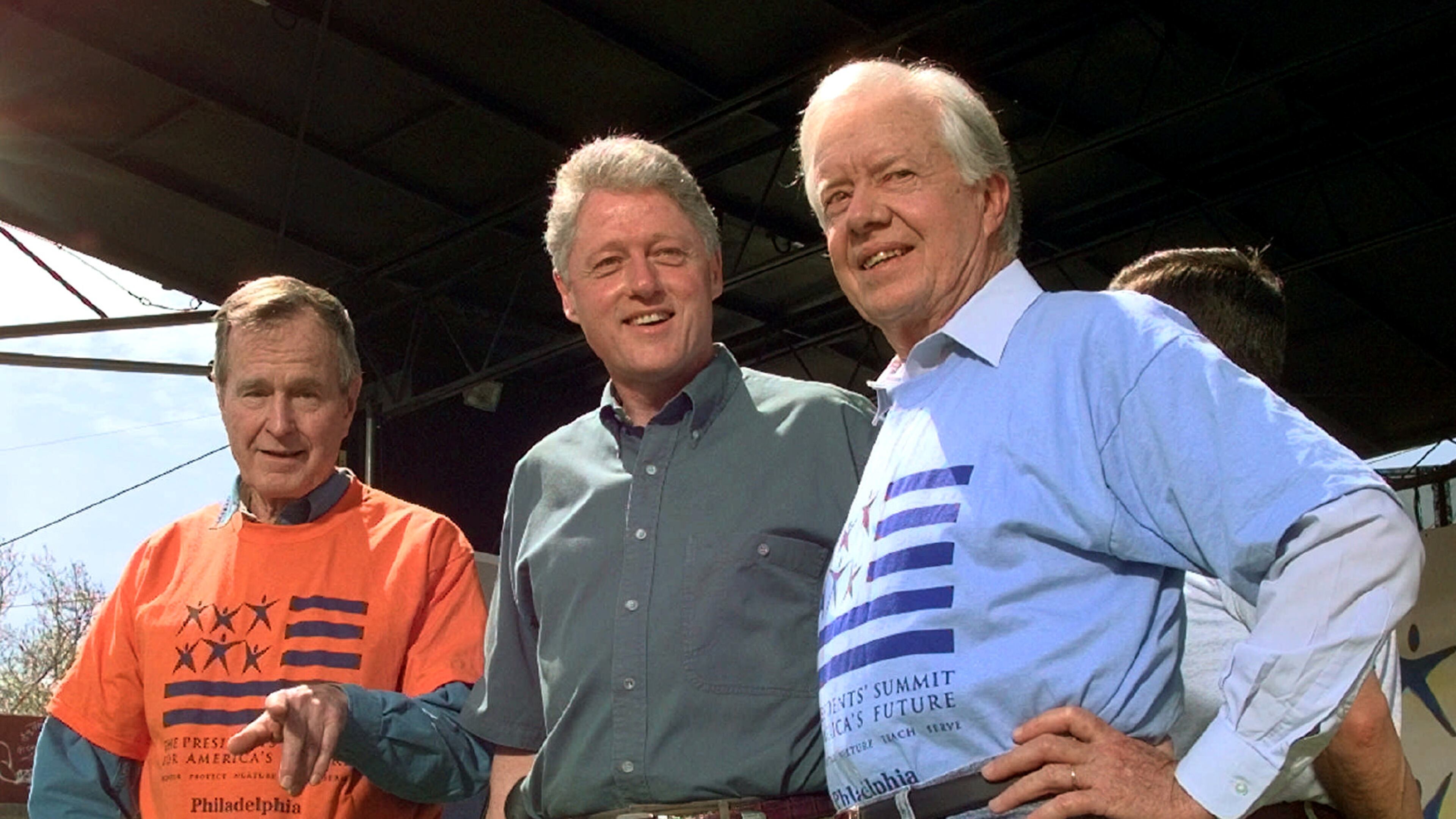 In this 1997 photo from a volunteer summit in Philadelphia, then President Bill Clinton is flanked by former Presidents George H.W. Bush( left) and Jimmy Carter (right, (AP Photo/Greg Gibson)