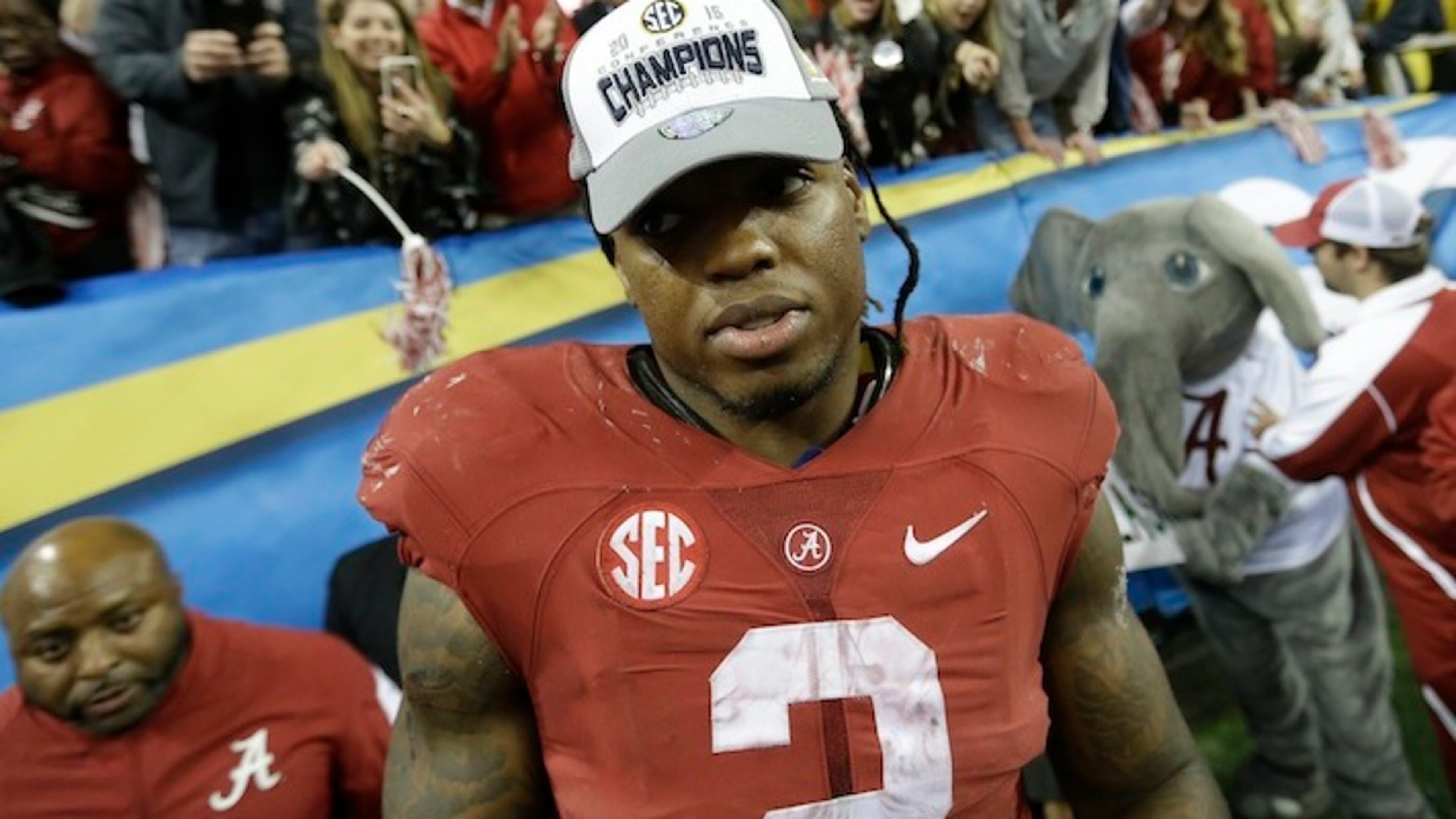 Alabama running back Derrick Henry (2) leaves the field after the second half of the Southeastern Conference championship NCAA college football game against Florida, Saturday, Dec. 5, 2015, in Atlanta. Alabama won 29-15. (AP Photo/David Goldman)