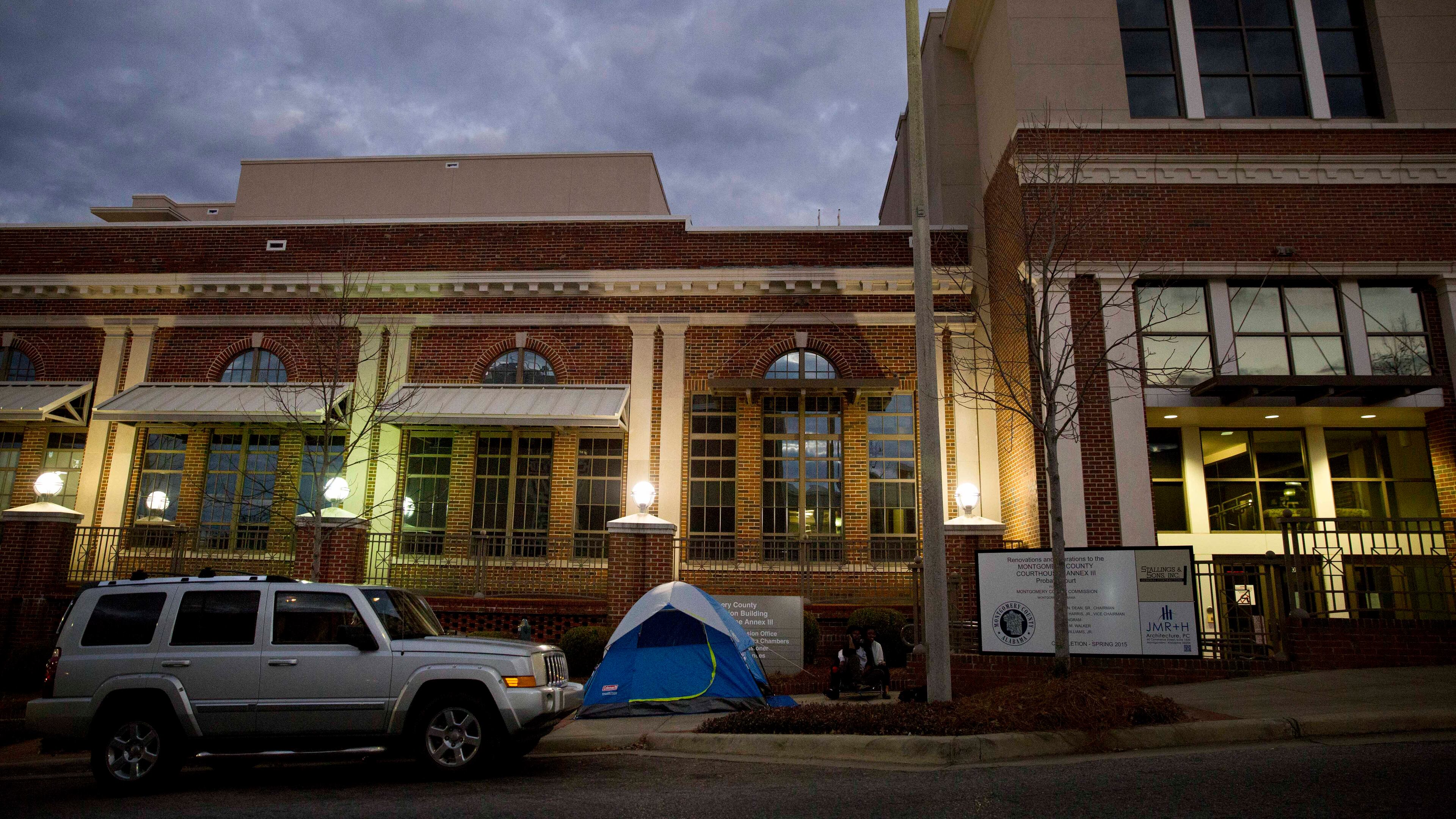 Shanté Wolfe, and Tori Sisson, camp out near the Montgomery County Courthouse Sunday, Feb. 8, 2015, in Montgomery, Ala. Wolfe and Sisson are planning to get married on Monday morning because they want to be the first couple to get married in Montgomery on Monday morning. (AP Photo/Brynn Anderson) Prospective wedding partners camp outside the courthouse in Montgomery, Ala. on Monday morning. AP/Brynn Anderson