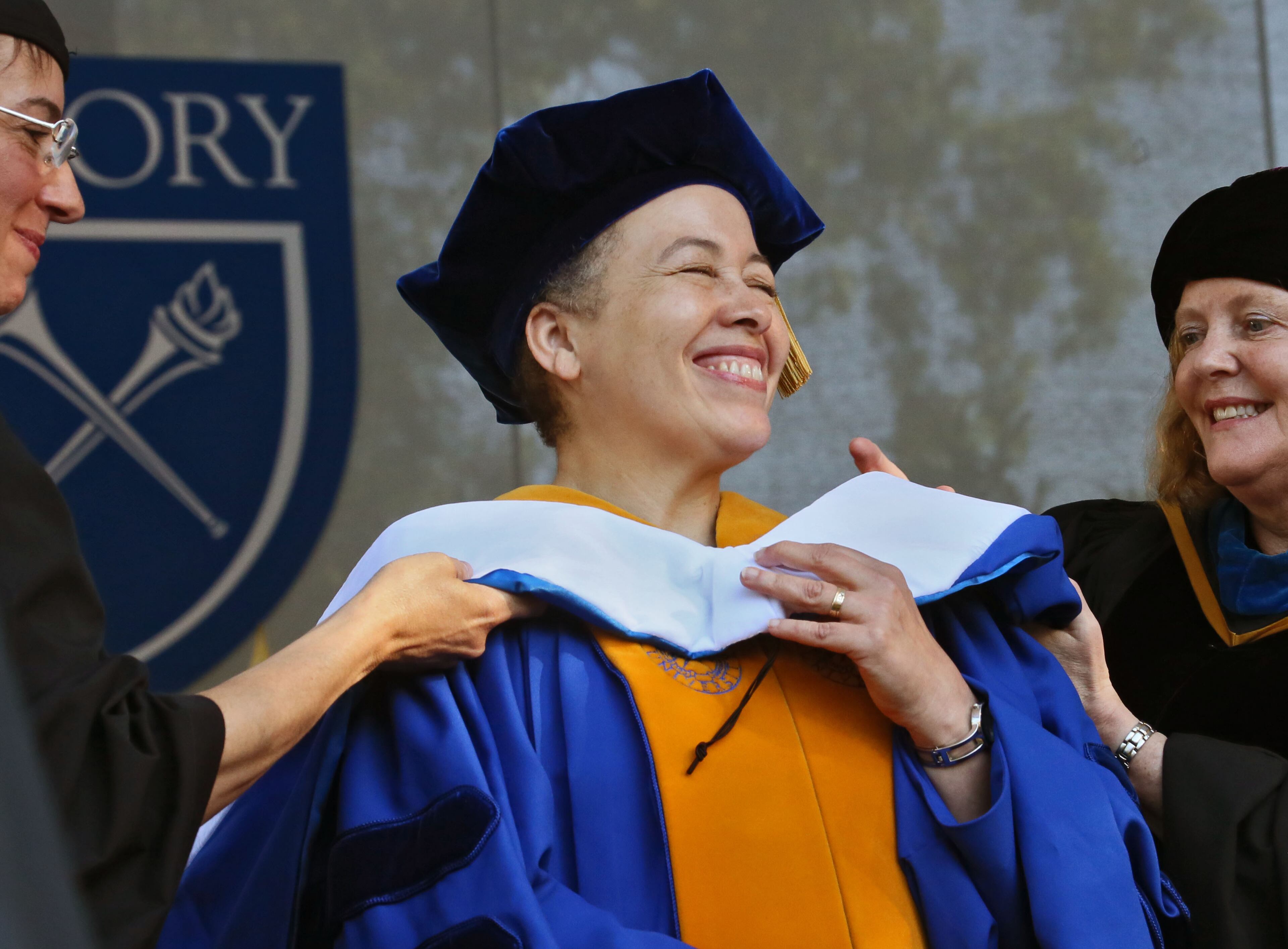 Beverly Tatum, the ninth President of Spelman College, receives an honorary Doctor of Humane Letters degree. U.S. Rep. and Civil Rights leader John Lewis was the keynote speaker at Emory University's 2014 spring commencement, Emory's 169th. 15,000 people were expected to attend. BOB ANDRES / BANDRES@AJC.COM
