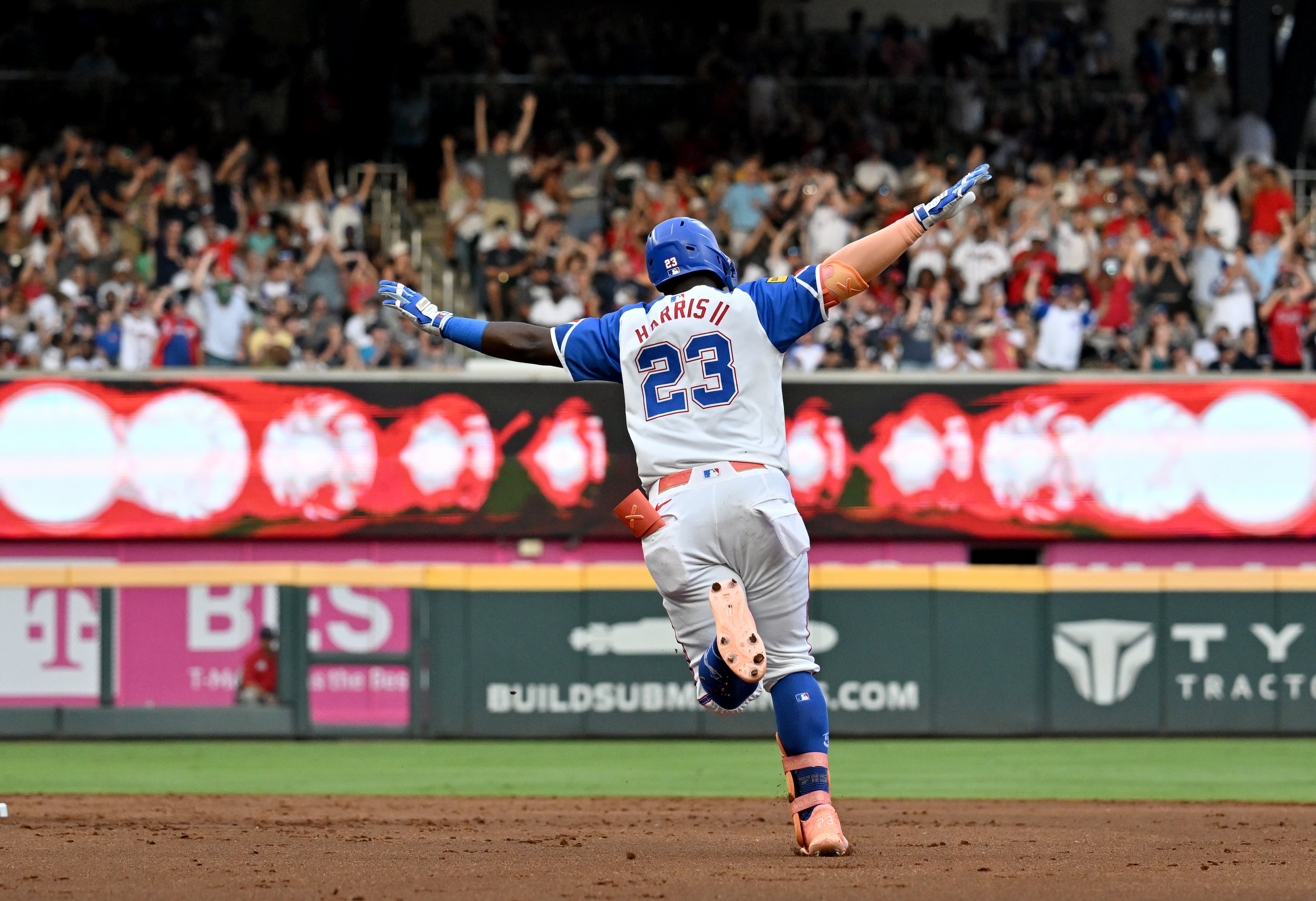 Atlanta Braves outfielder Michael Harris II (23) celebrates as he circles the bases on a solo home run during the third inning of a baseball game at Truist Park, Saturday, July 19, 2025, in Atlanta. New York Yankees won 12-9 over Atlanta Braves. (Hyosub Shin / AJC)