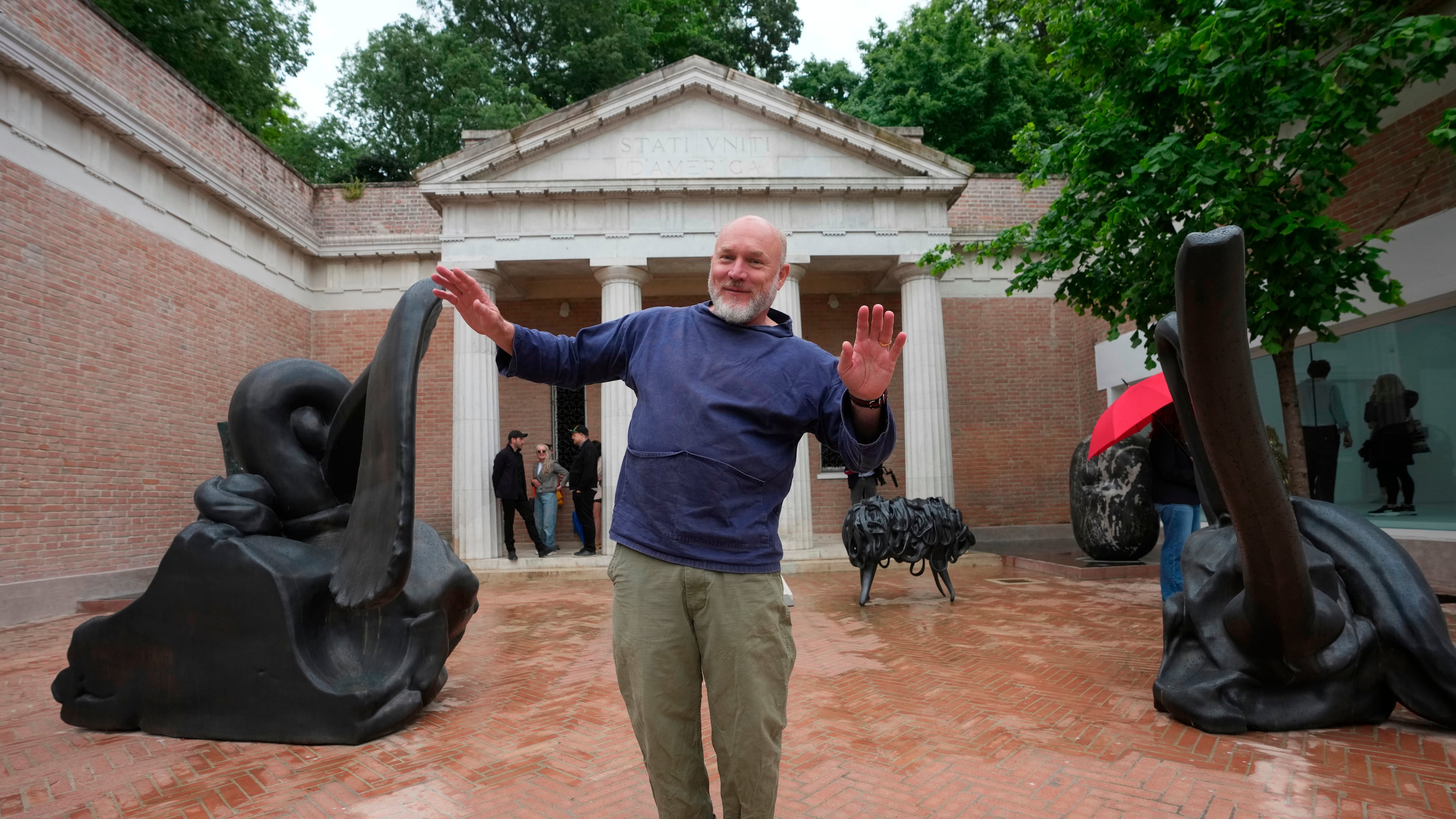 Artist Alma Allen poses outside the United States pavilion 'Call Me the Breeze' at the Venice 2026 Biennale Art, in Venice, Italy, Tuesday, May 5, 2026. (AP Photo/Luca Bruno)