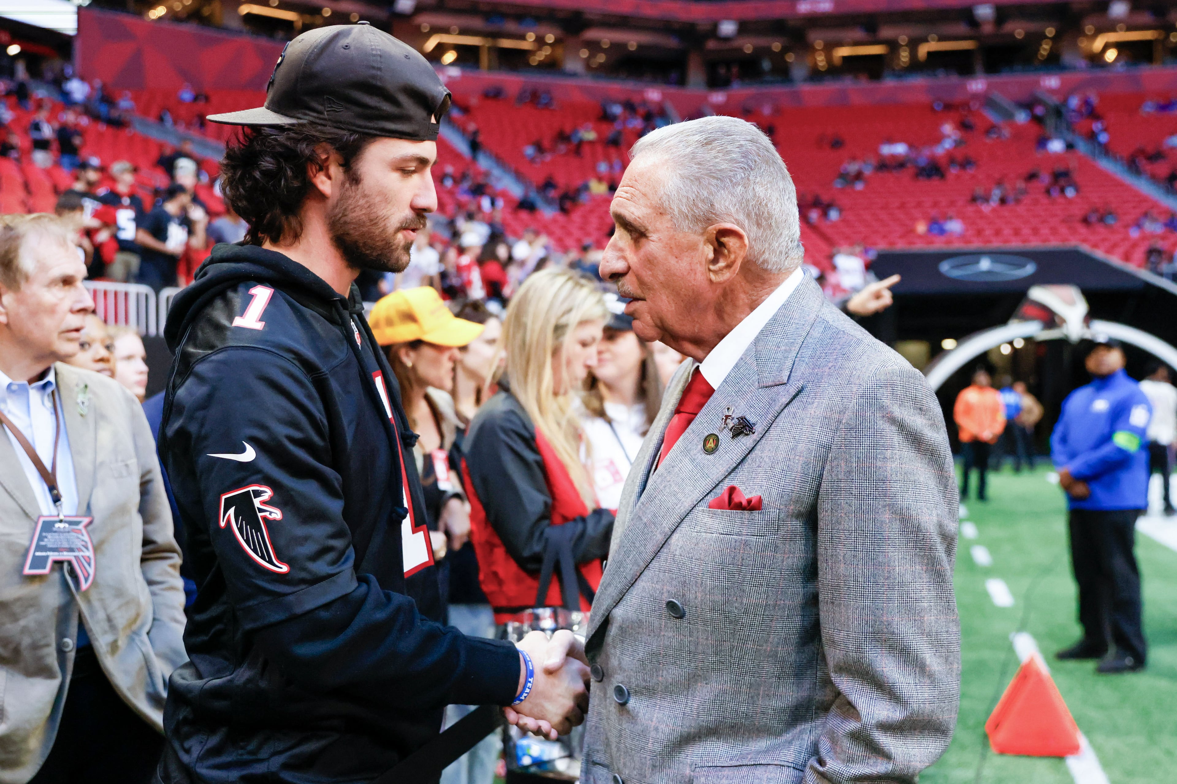 Former Atlanta Braves shortstop Dansby Swanson speaks with Falcons owner Arthur Blank prior to the game between the Falcons and the Vikings on Sunday, Nov. 5, 2023, at Mercedes-Benz Stadium in Atlanta.
Miguel Martinez/miguel.martinezjimenez@ajc.com