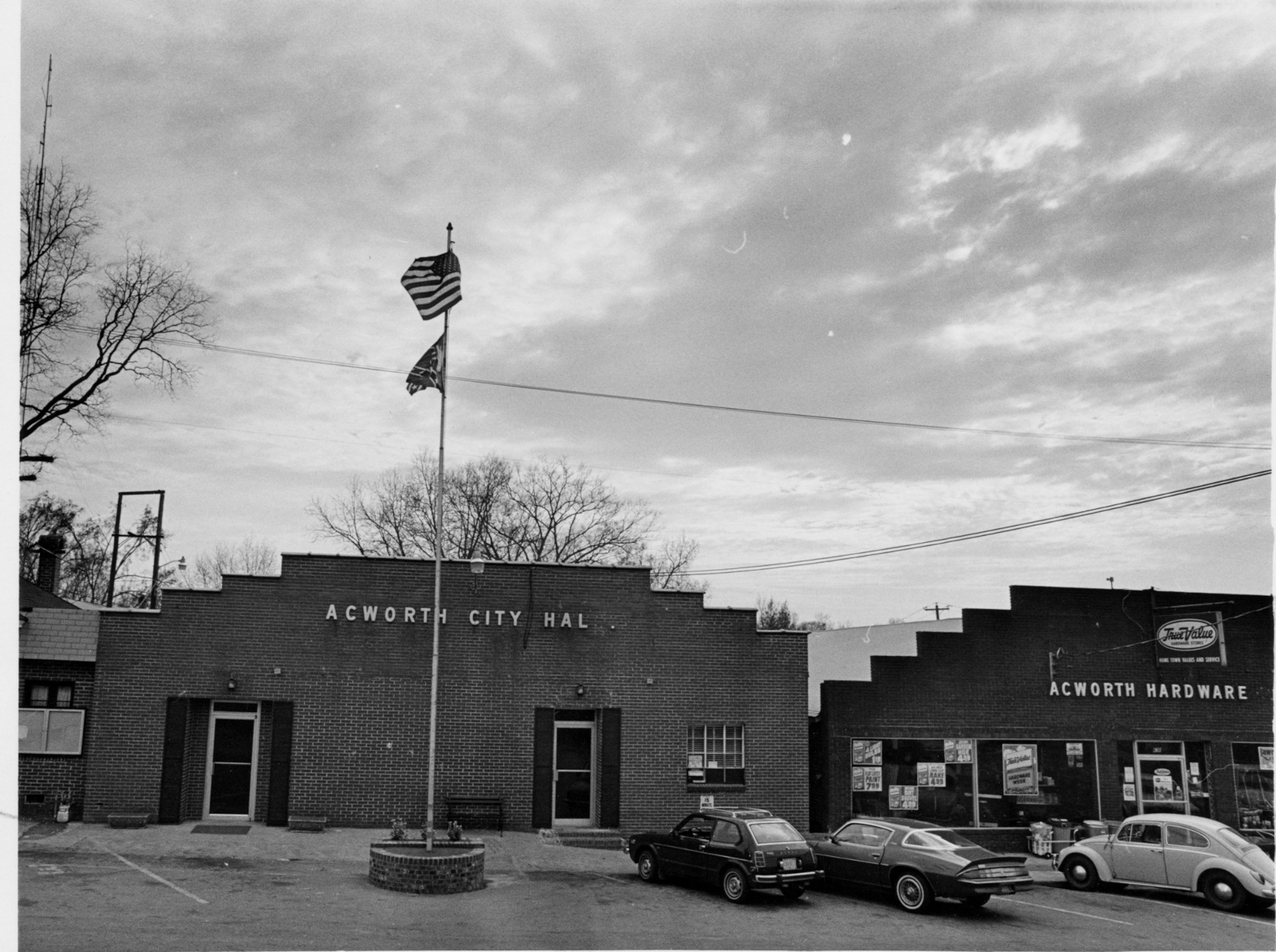 1981 - Acworth, Ga: Exterior of Acworth City Hall and Acworth Hardware buildings.