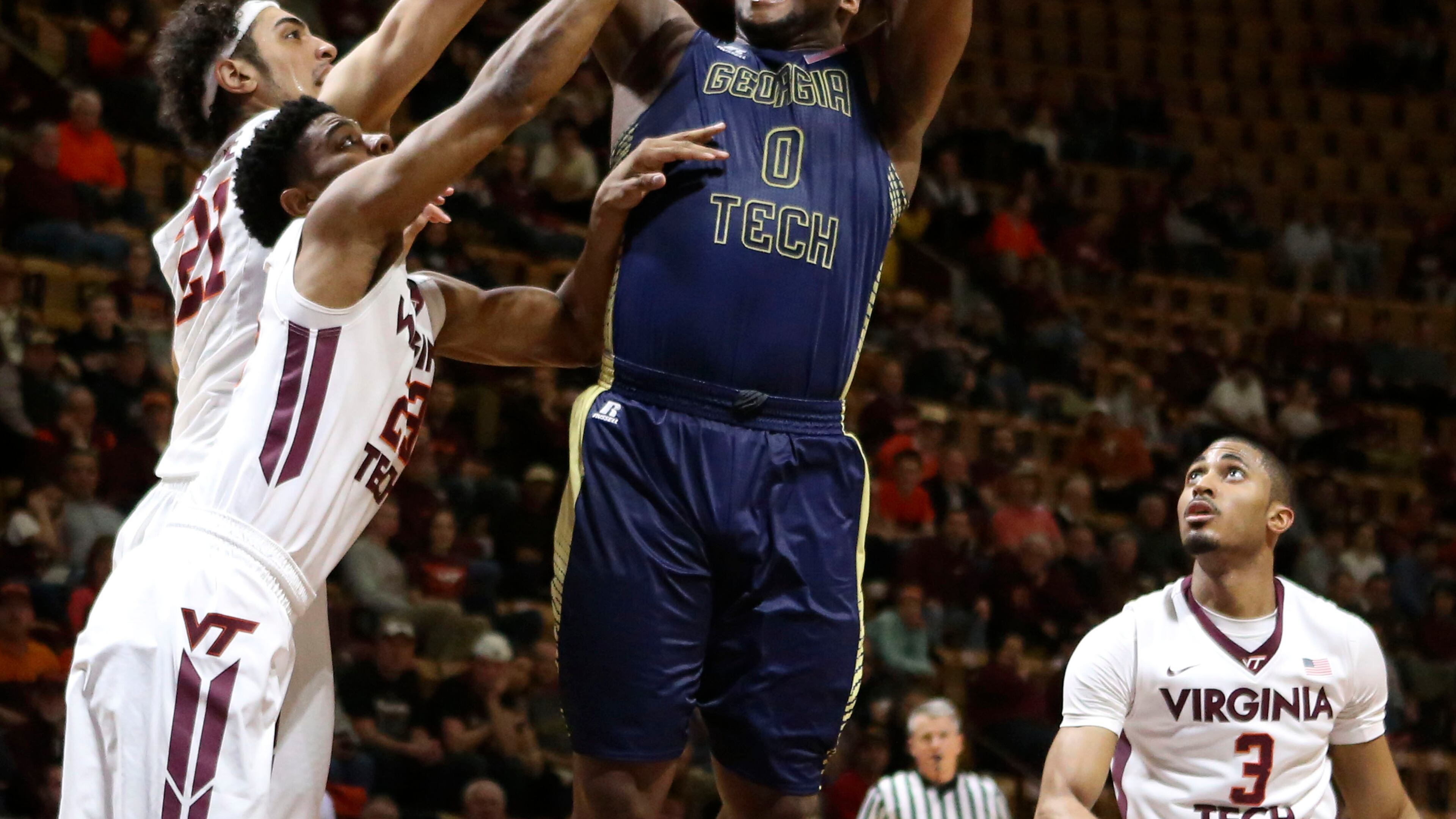 Georgia Tech's Charles Mitchell (0) shoots while being defended by Georgia Tech during first half action of the NCAA basketball game in Blacksburg, Va., Monday, Feb. 9 2015. (AP Photo / The Roanoke Times, Matt Gentry) LOCAL TELEVISION OUT; SALEM TIMES REGISTER OUT; FINCASTLE HERALD OUT; CHRISTIANBURG NEWS MESSENGER OUT; RADFORD NEWS JOURNAL OUT; ROANOKE STAR SENTINEL OUT Georgia Tech forward Charles Mitchell scored a team-high 17 points and didn't commit a turnover for the second game in a row. (ASSOCIATED PRESS)