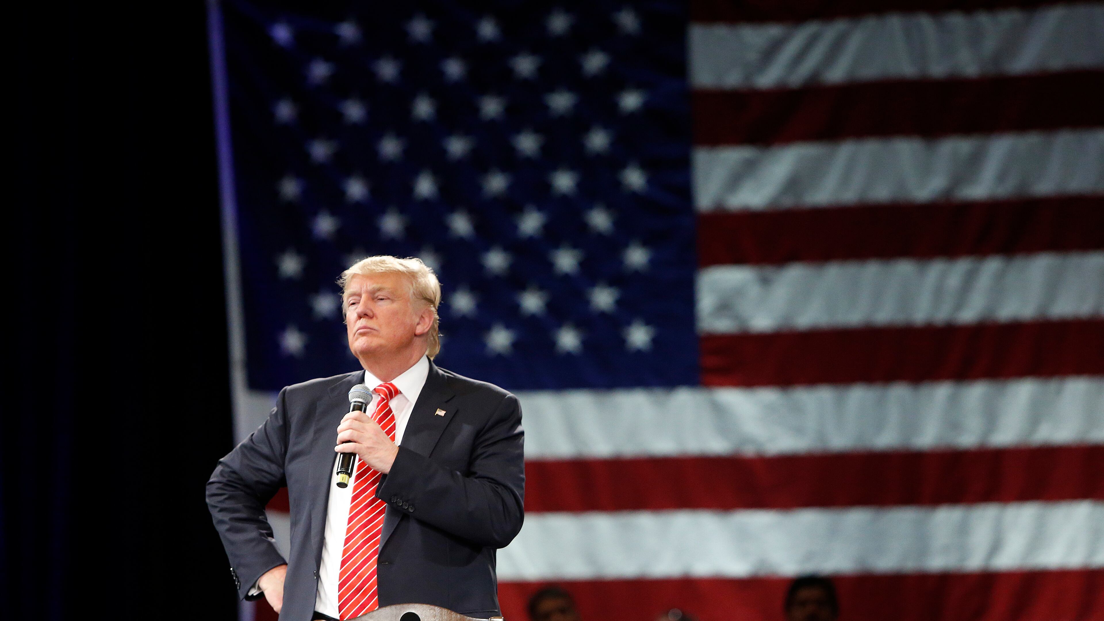 TAMPA, FL - MARCH 14: Republican presidential candidate Donald Trump speaks to supporters during a town hall meeting on March 14, 2016 at the Tampa Convention Center in Tampa , Florida. Trump is campaigning ahead of the Florida primary on March 15. (Photo by Brian Blanco/Getty Images)
