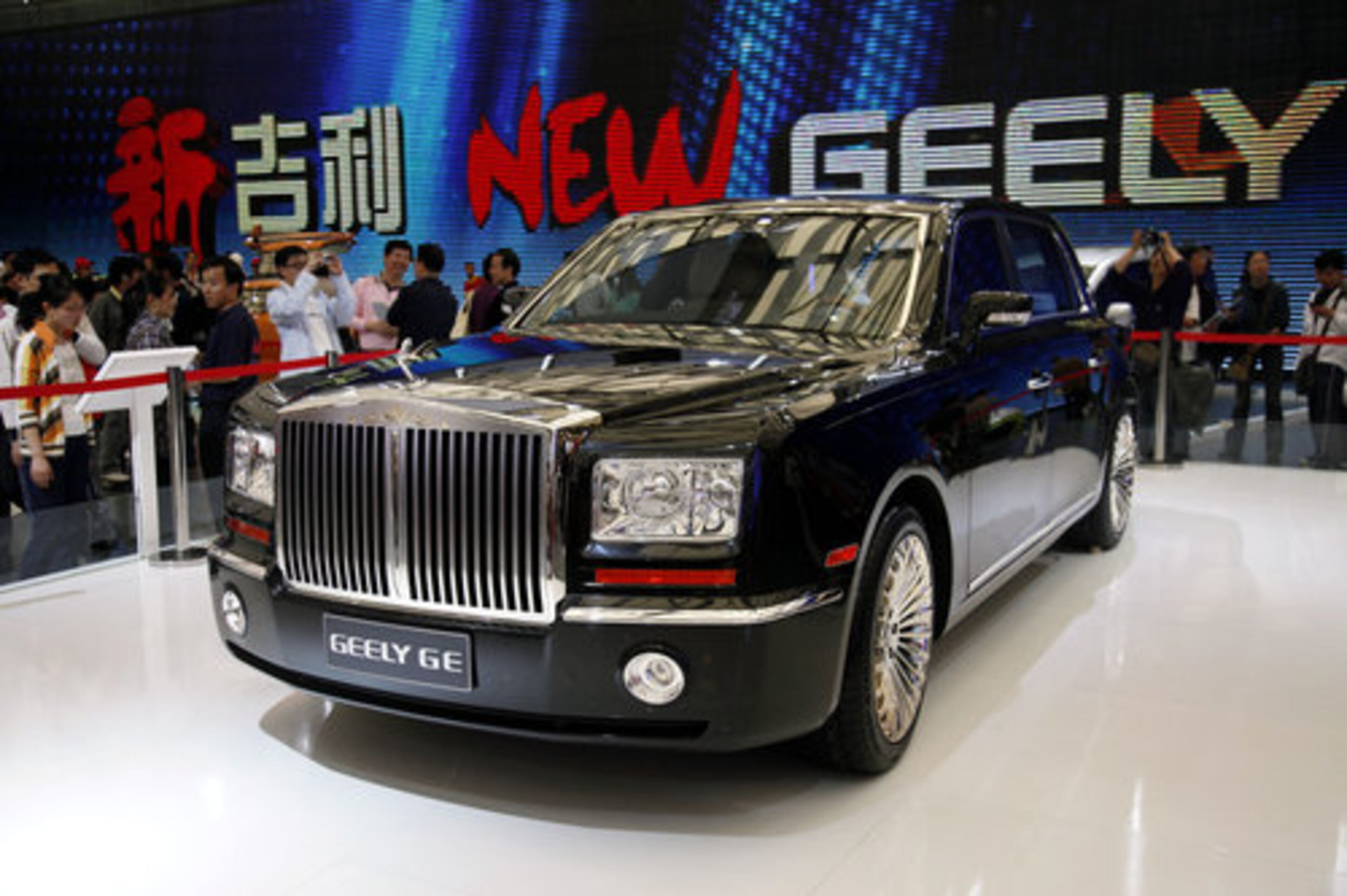 From electric vehicles to the biggest gas-guzzling SUVs, China's automakers are maneuvering to upstage their global rivals in the only major market that is showing resilience during the global financial crisis. Visitors look at the Geely GE model, made in China.