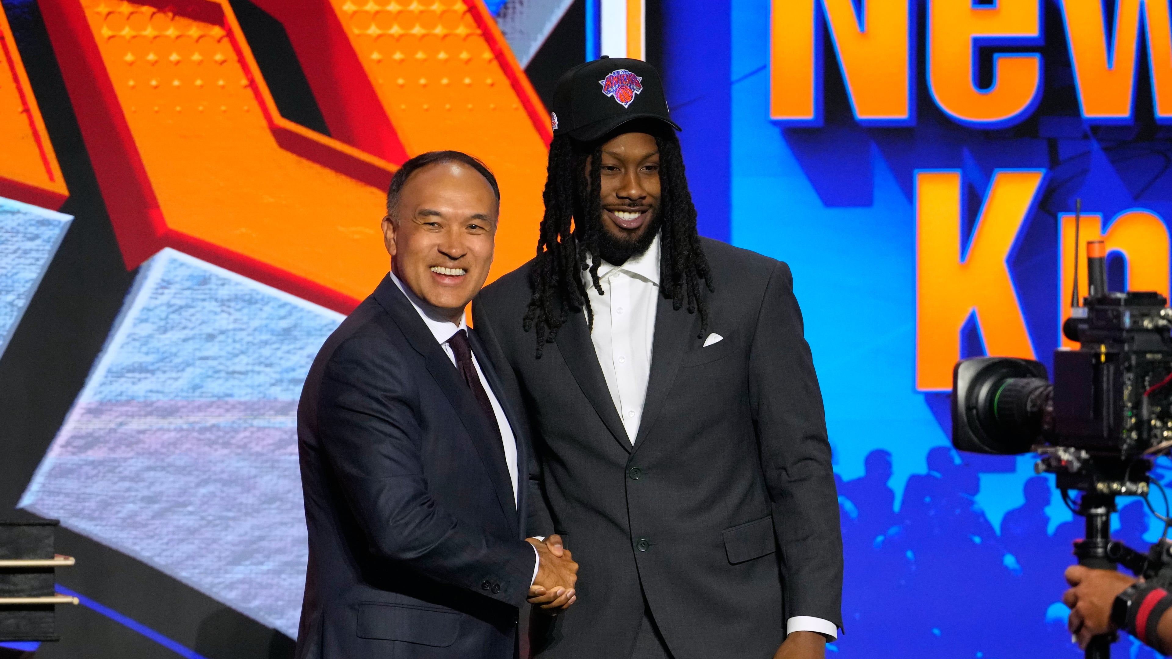 Bruce Thornton poses for a photo with NBA Deputy Commissioner Mark Tatum after being selected by the New York Knicks in the second round of the NBA basketball draft Wednesday, June 24, 2026, in New York. (AP Photo/Yuki Iwamura)