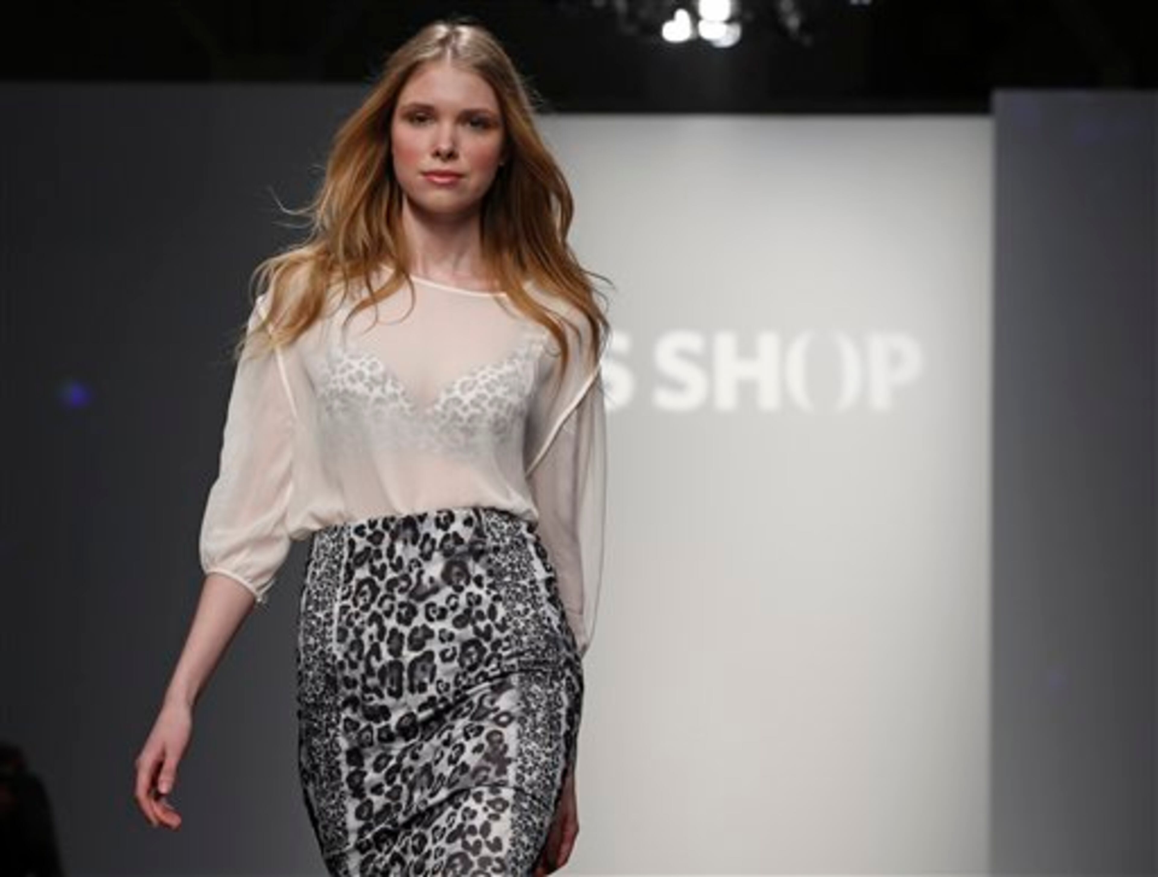 A model walks the runway during the presentation of the GS Shop Lingerie show featuring Spanx, Wonderbra, Platex and Anna Sui during Fashion Week Tuesday, Feb. 4, 2014, in New York. (AP Photo/Kathy Willens)