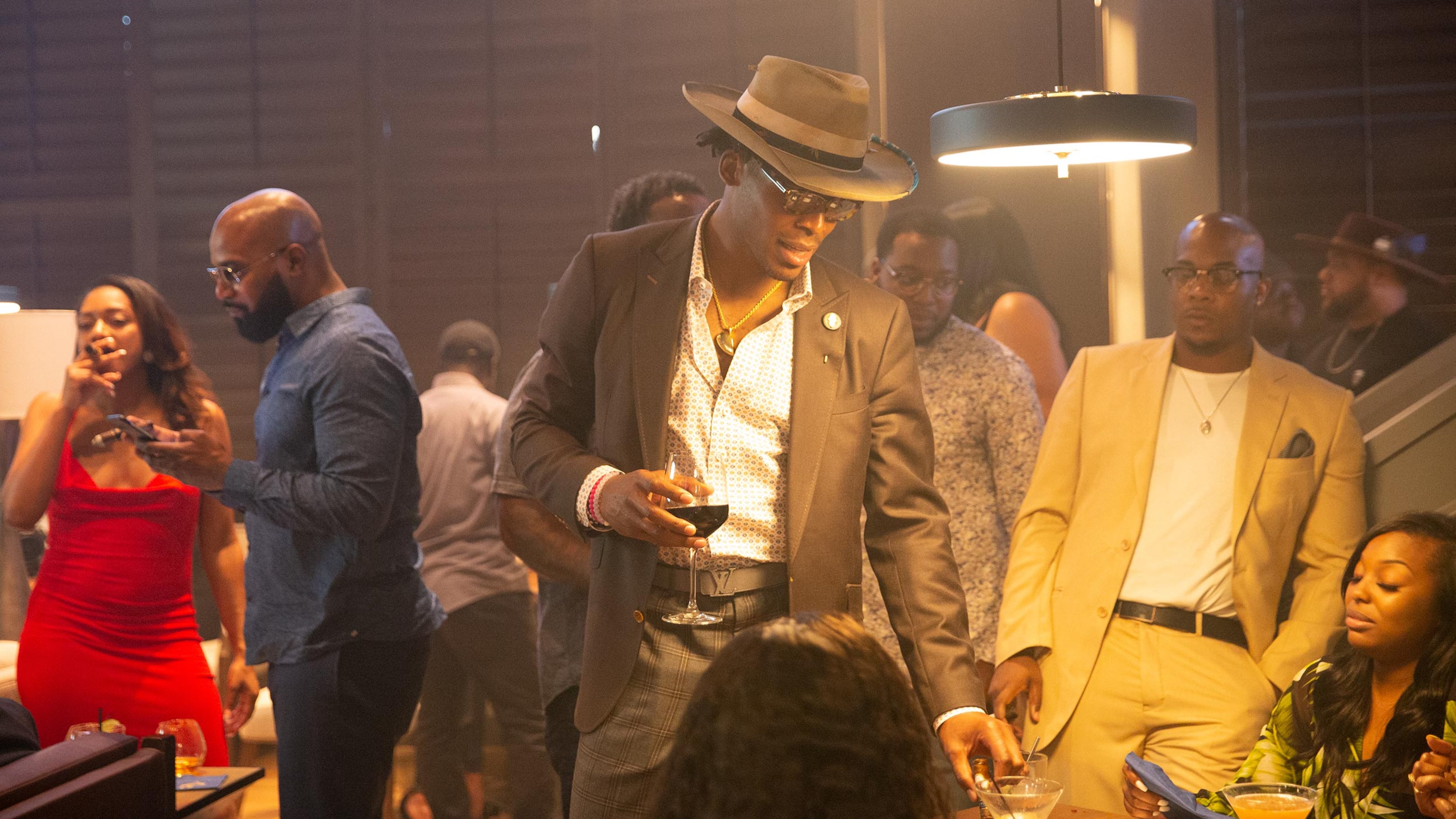 Cam Newton mingles with the guests at the Fellaship official opening. Photo by Marc Fisher/Melt ATL